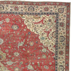 Early 20th Century Red and Beige Stylized Floral Turkish Hereke Rug