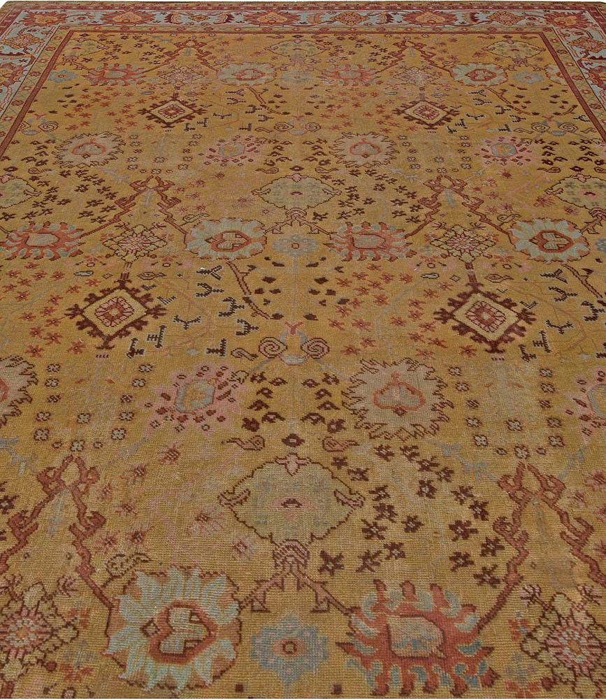 Early 20th century Turkish Oushak handmade wool rug
Size: 11'0