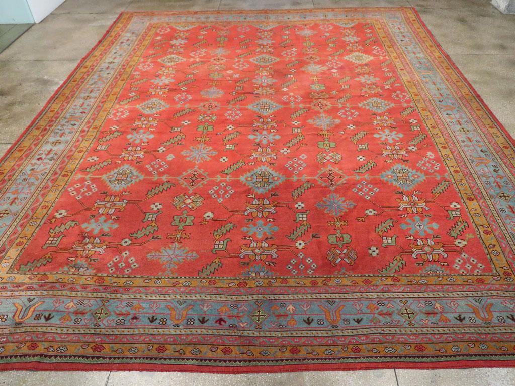 Antigua alfombra turca Oushak de gran tamaño hecha a mano a principios del siglo XX.

Medidas: 14' 4