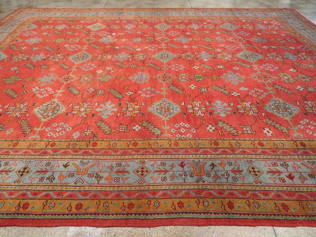 Gran alfombra turca Oushak de principios del siglo XX Anudado a mano en venta