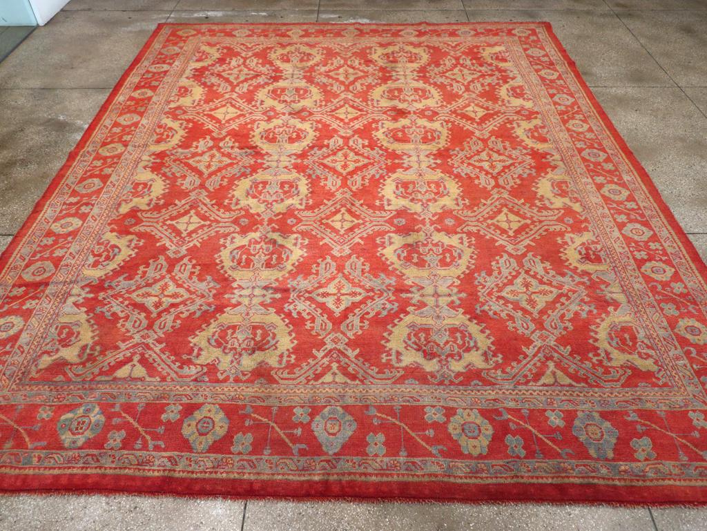 An antique Turkish Oushak large room size carpet handmade during the Early 20th century.

Measures: 12' 1