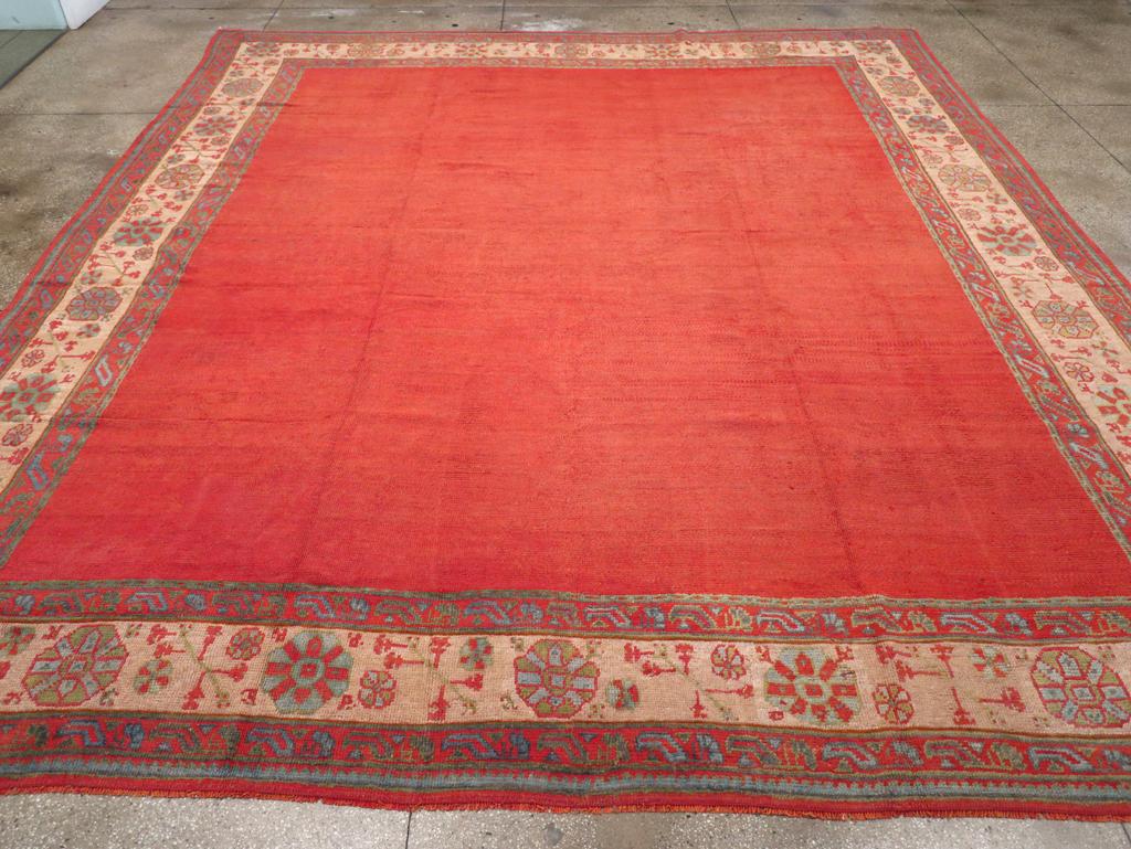 An antique Turkish Oushak large room size carpet handmade during the Early 20th century.

Measures: 13' 8