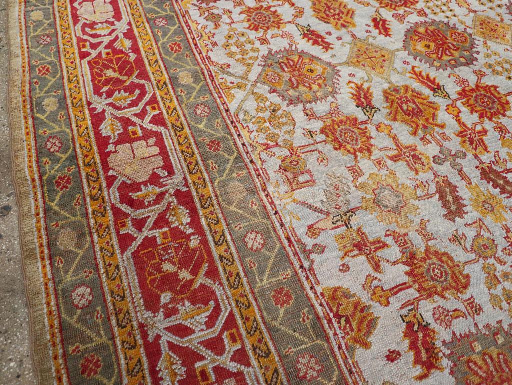 Hand-Knotted Early 20th Century Turkish Oushak Large Room Size Carpet For Sale