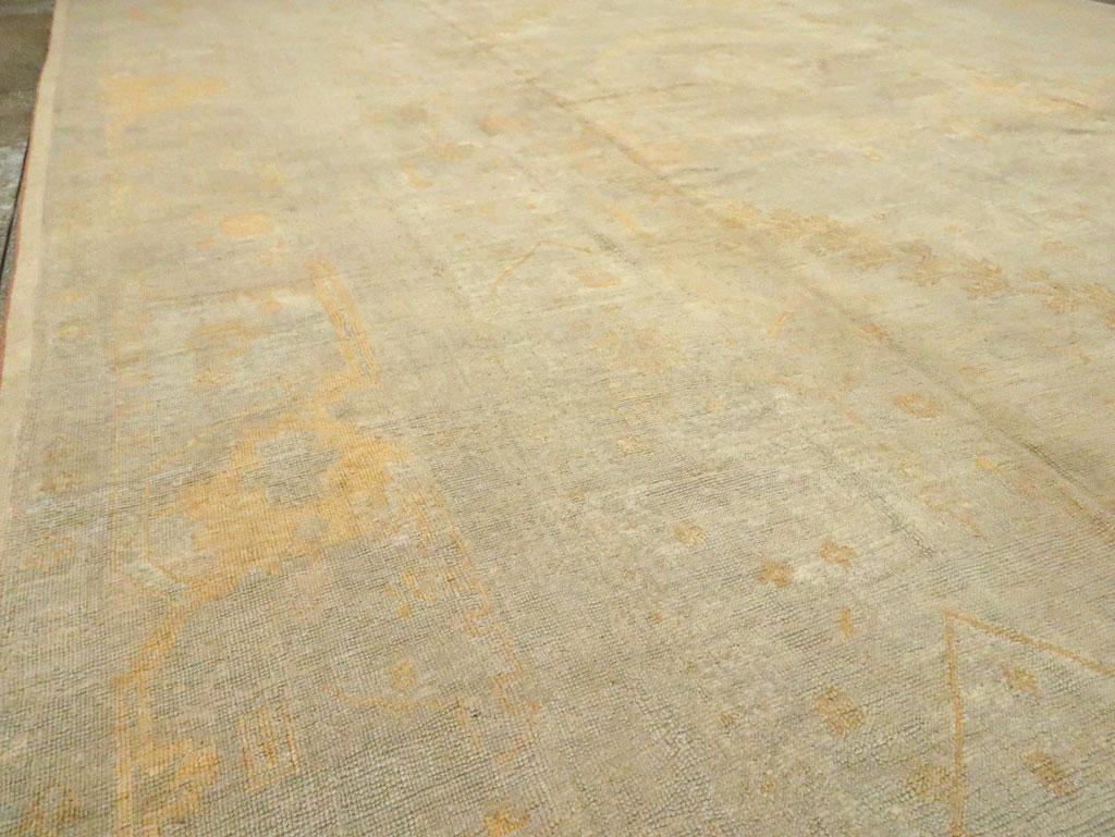 Hand-Knotted Early 20th Century Turkish Oushak Oversize Carpet For Sale