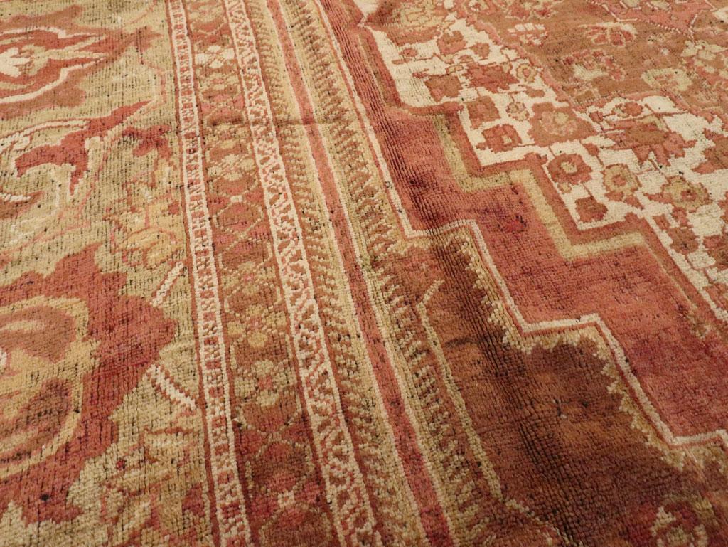 Hand-Knotted Early 20th Century Turkish Oushak Room Size Carpet For Sale
