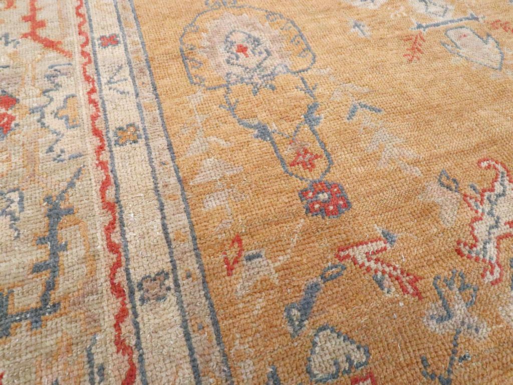 Hand-Knotted Early 20th Century Turkish Oushak Room Size Carpet For Sale