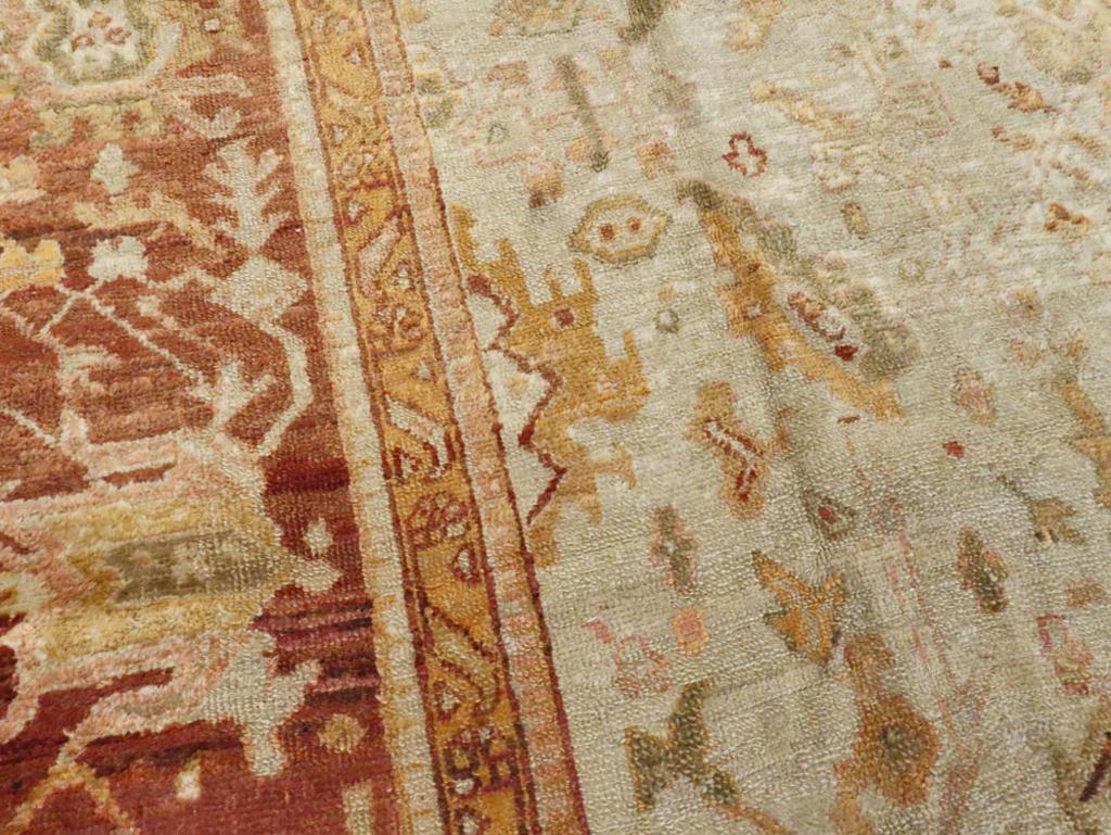 Hand-Knotted Early 20th Century Turkish Oushak Room Size Carpet For Sale