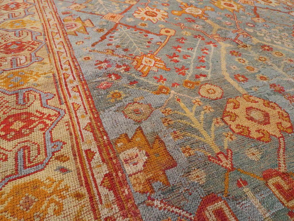 Hand-Knotted Early 20th Century Turkish Oushak Room Size Carpet For Sale