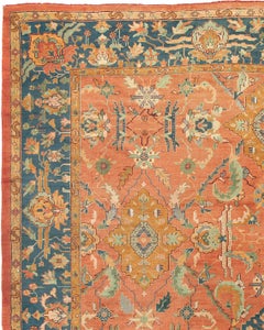 Early 20th Century Turkish Salmon Stylized Floral Oushak Rug