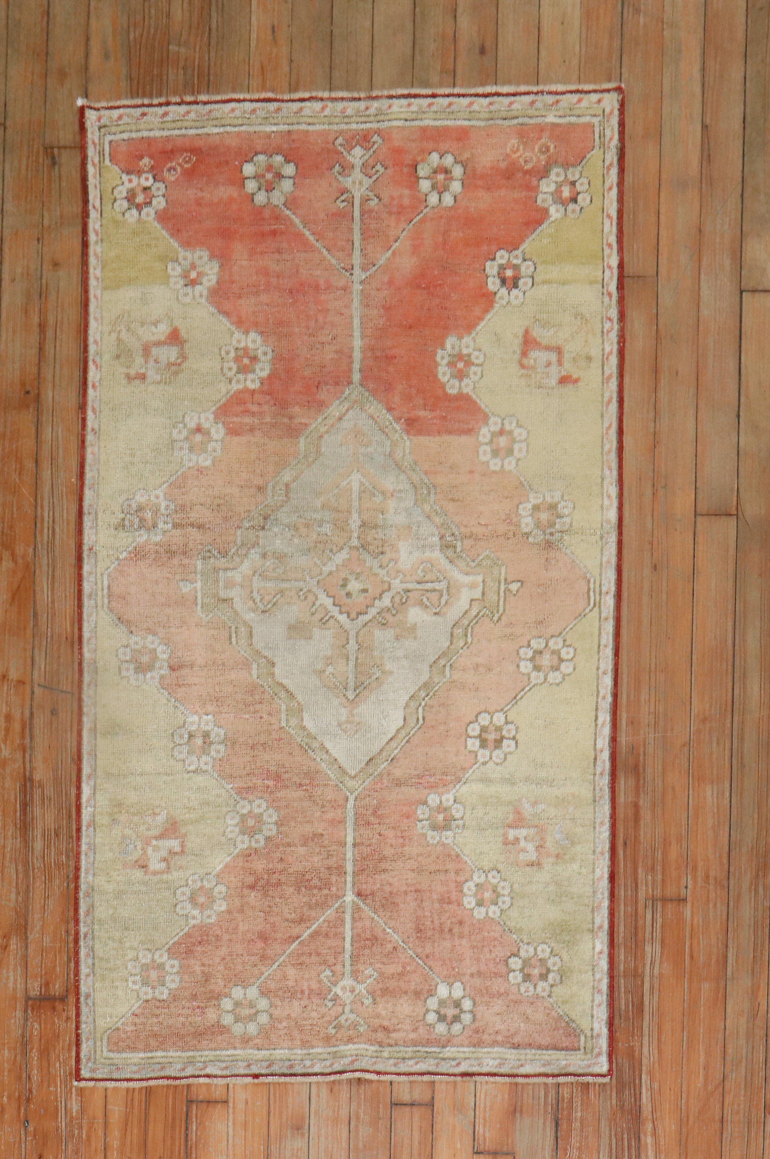 An early 20th century Turkish Sivas Scatter size rug with a muted palette.

Measures: 2'6'' x 4'7''.