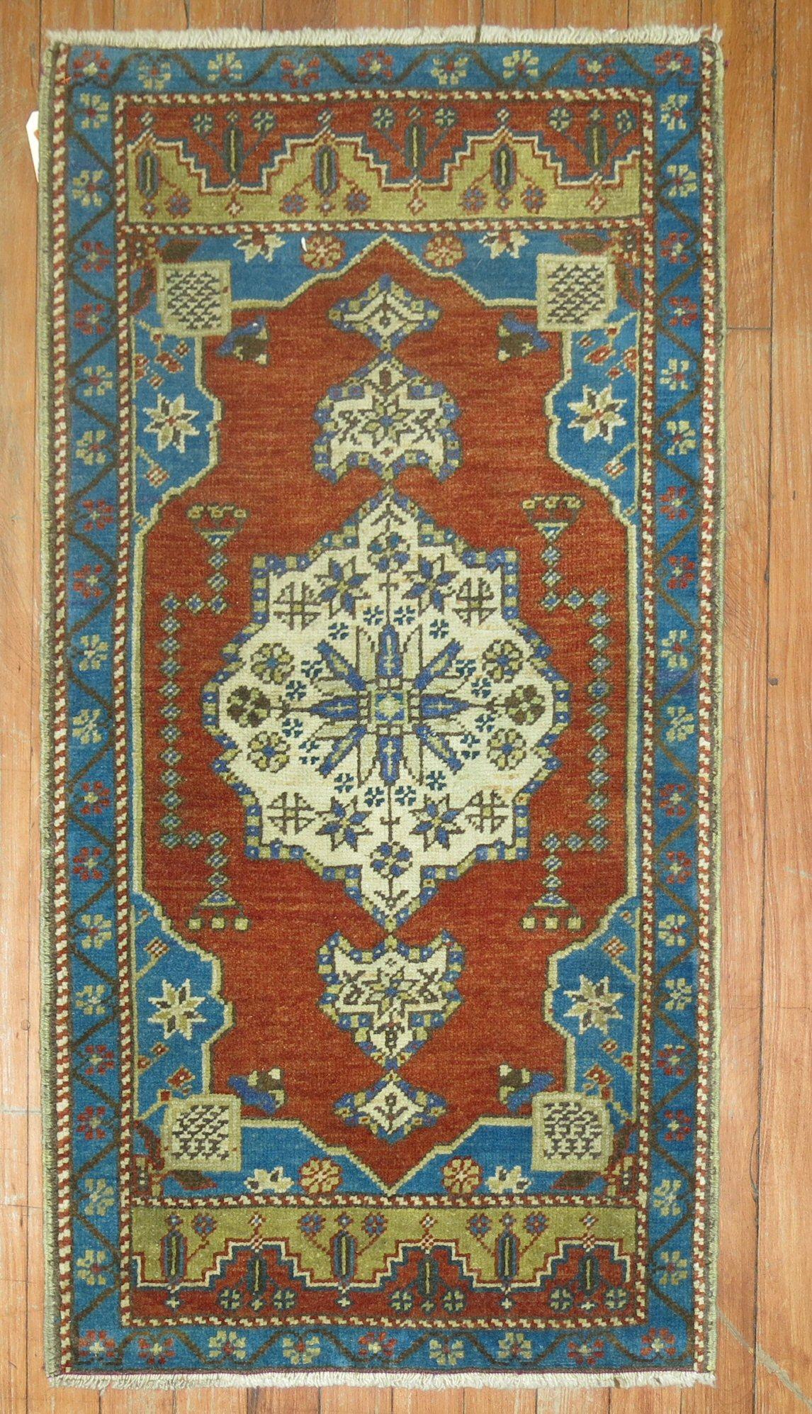 early 20th-century Turkish mini rug

Measures: 1'9'' x 3'3''.