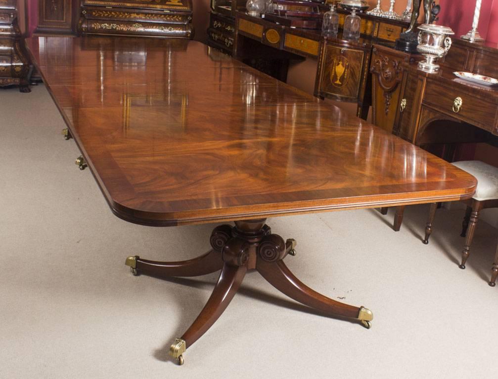 This is an elegant antique dining set comprising a Regency style dining table, circa 1900 in date, with a fabulous set of 14 bespoke dining chairs.

The table has two leaves which can be added or removed as required to suit the occasion and it