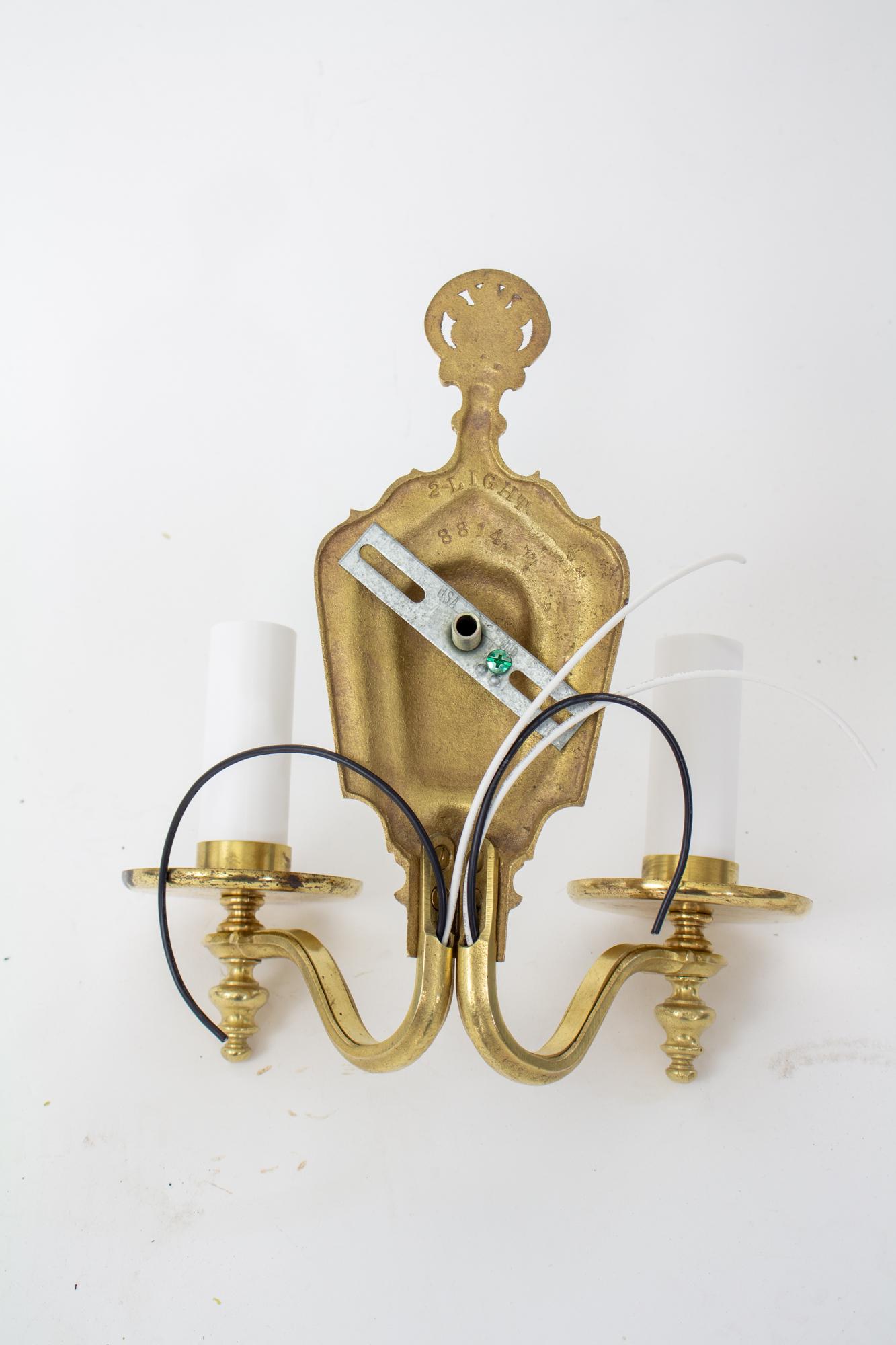 North American Early 20th Century Two Arm Brass Miller Sconce For Sale