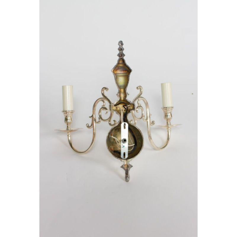 Two light sconce, traditional colonial style. 

Material: silver
Style: American Classical, Traditional
Place of origin: United States
Period made: early 20th century
Dimensions: 15 × 8 × 15 in
Condition details: excellent condition,