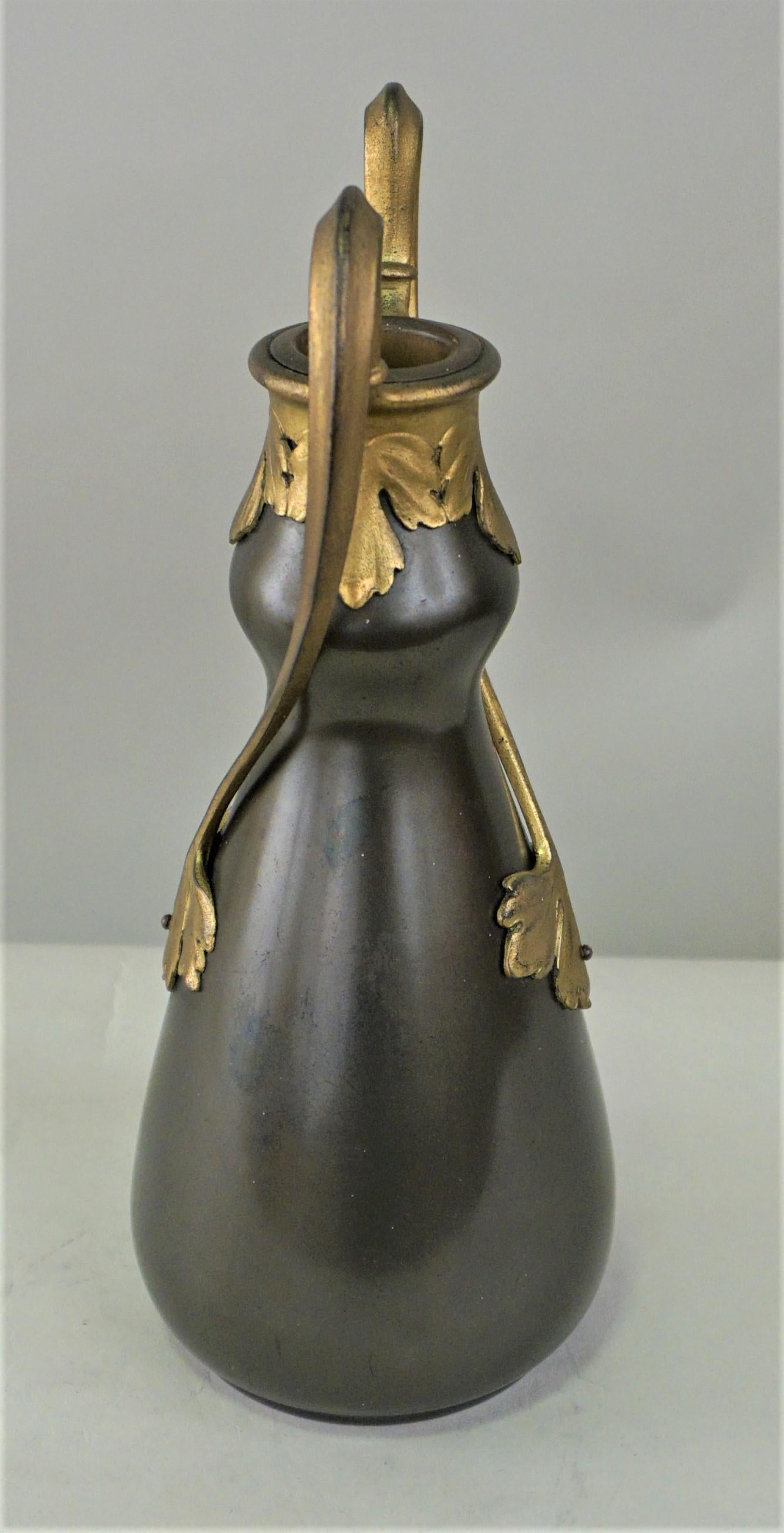 Early 20th century simple but elegant gold and brown finish Art Nouveau vase.