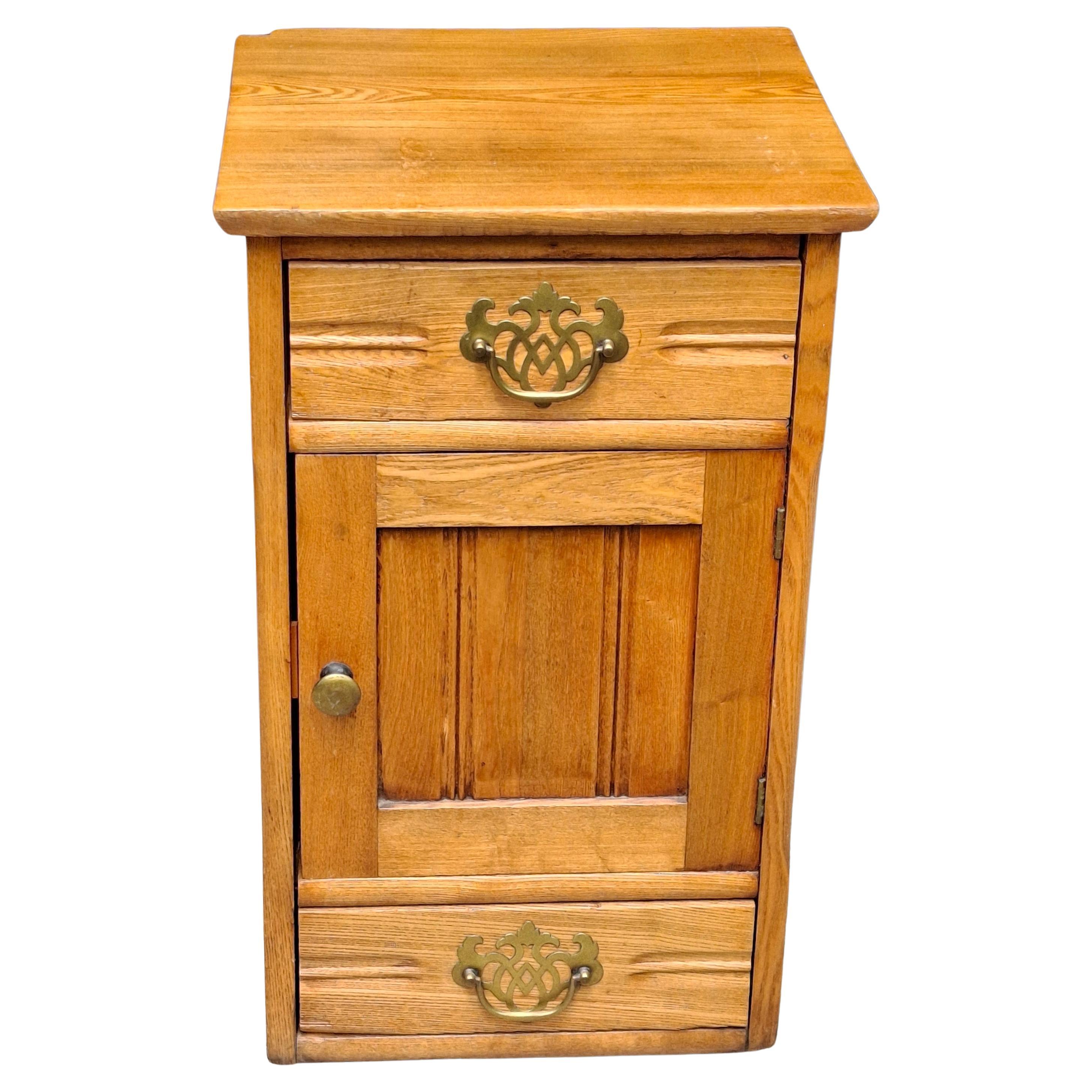 Early 20th Century Two-Drawer Oak Rolling Bedside Cabinet