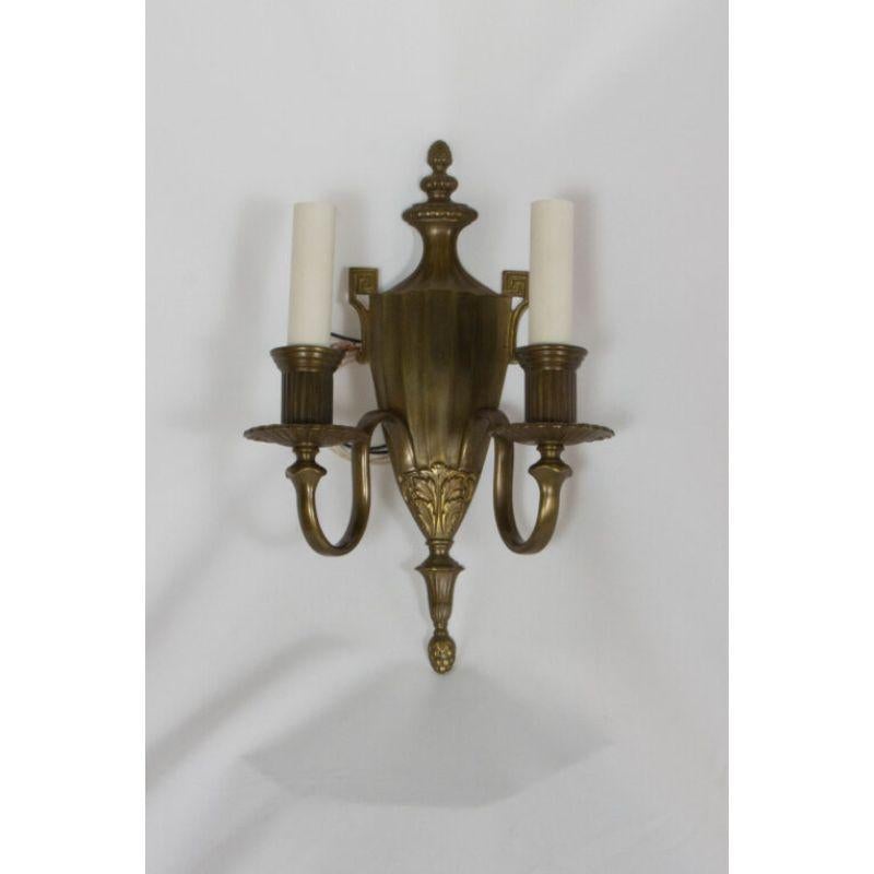 Brass Early 20th Century Urn Form Sconces with Porcelain Candlecovers, a Pair For Sale