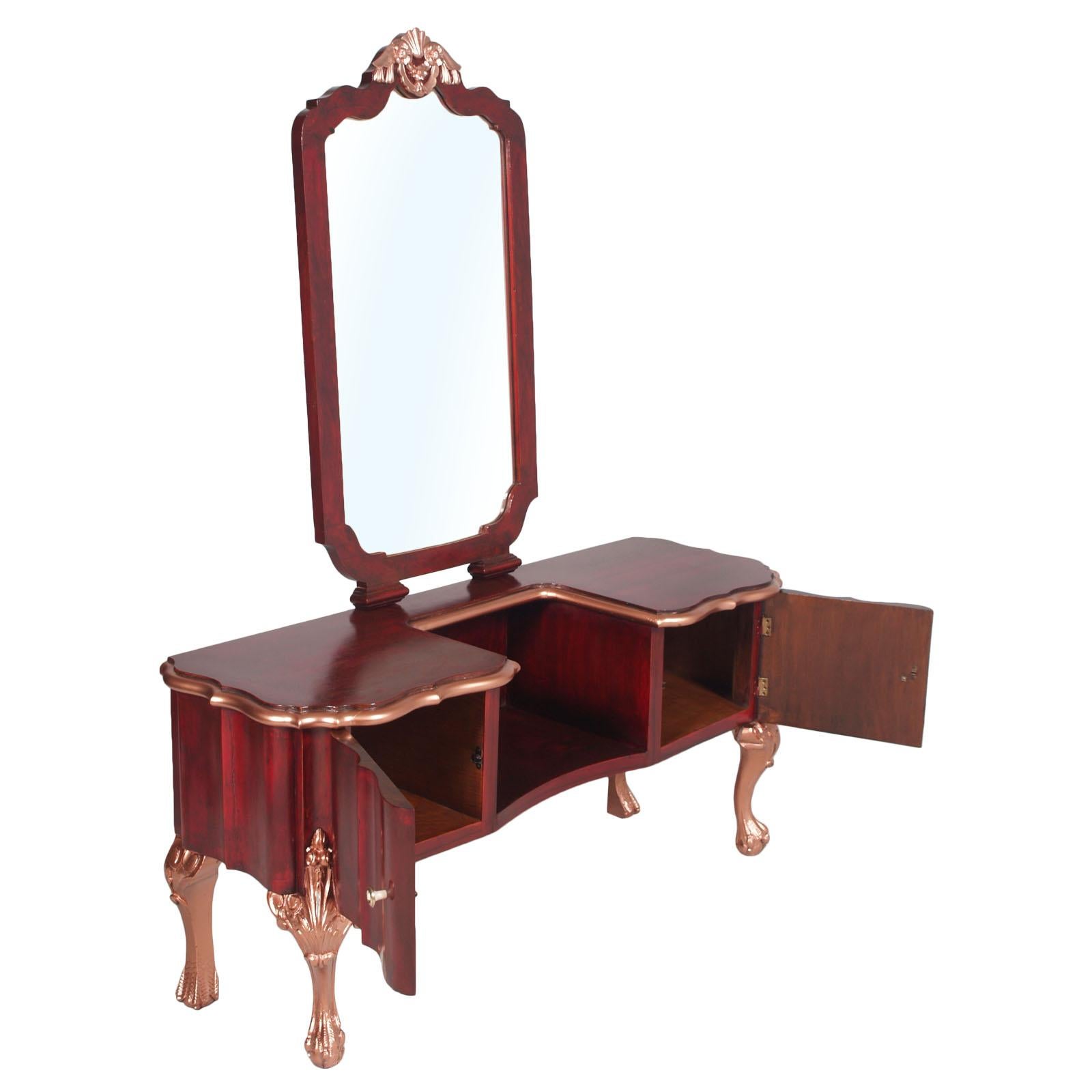 1920s a Testolini & Salviati Venetian Baroque vanity or mirrored console or dressing table, in solid carved walnut and walnut veneer.
Carving parts with copper leaf applied.
Original handles in bone and golden brass.
A precious entrance console
