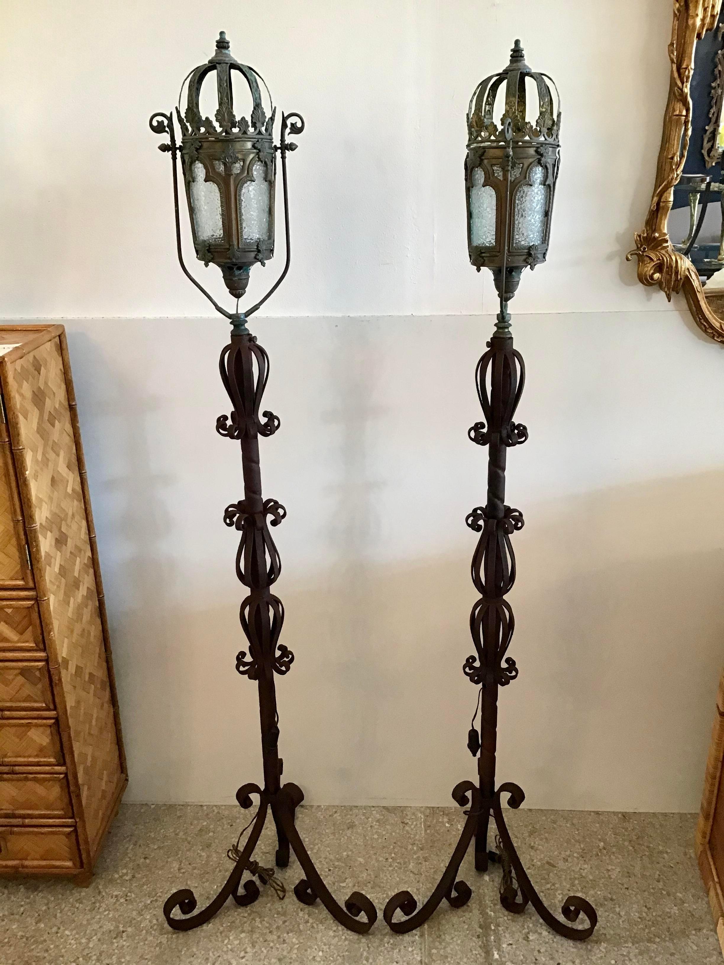 Amazing pair of Venetian iron floor lamps. Both are handmade with incredible detail.