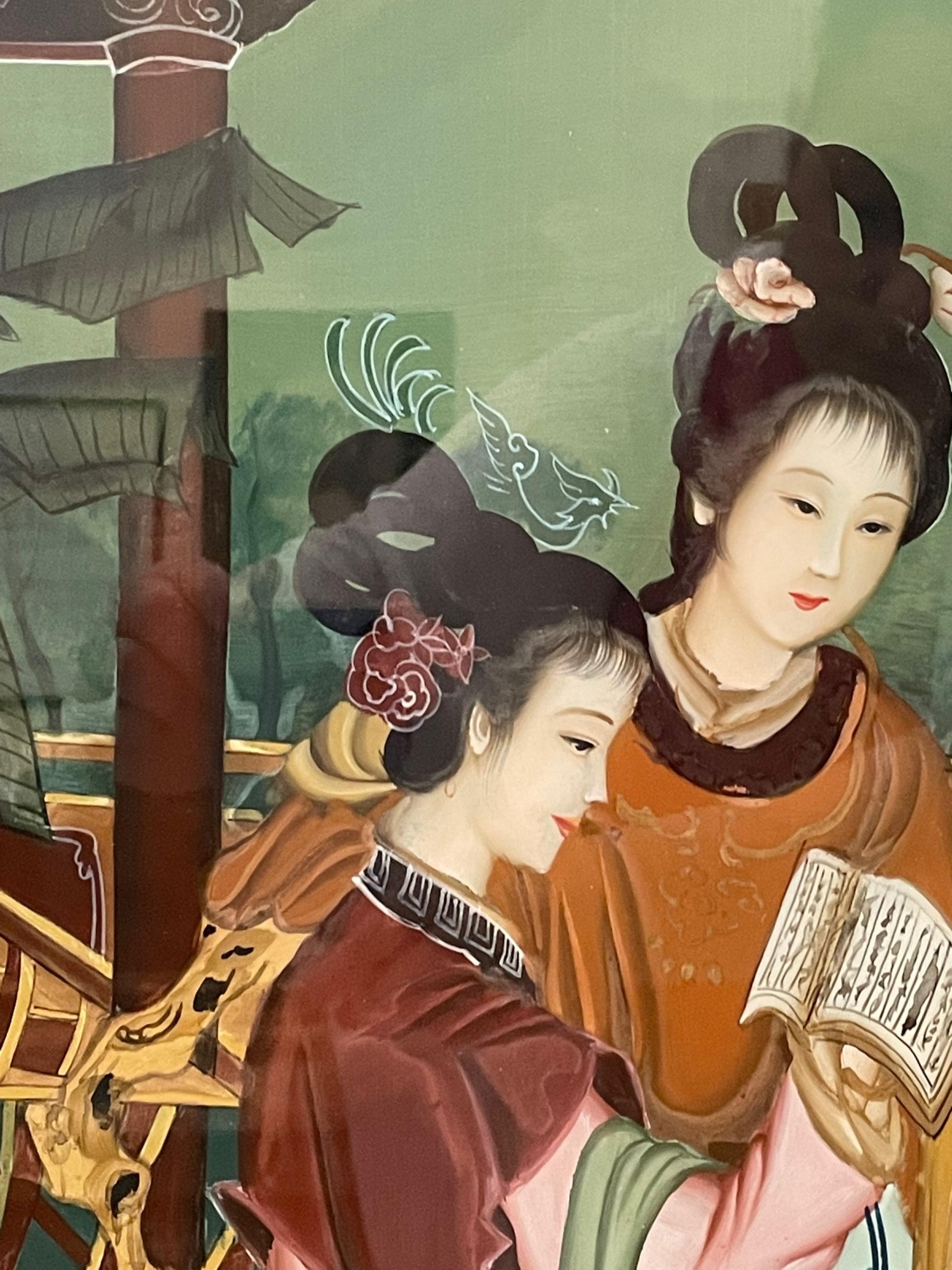 Early 20th century Verre Eglomise Chinese export reverse glass painting

Beautiful Chinese reverse glass painting of two women reading a scroll. This painting is exquisite in color and detail. The wood frame painting is in good overall condition.