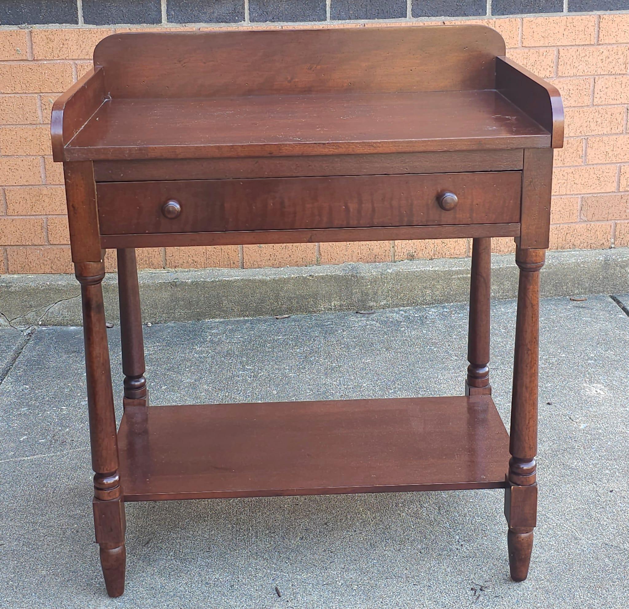 An early 20th Century Victorian Style Mahogany Work Table or Sewing Table in great antique condition. 
Measures 27