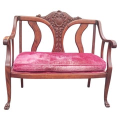 Early 20th Century Victorian Style Carved Mahogany and Upholstered Settee