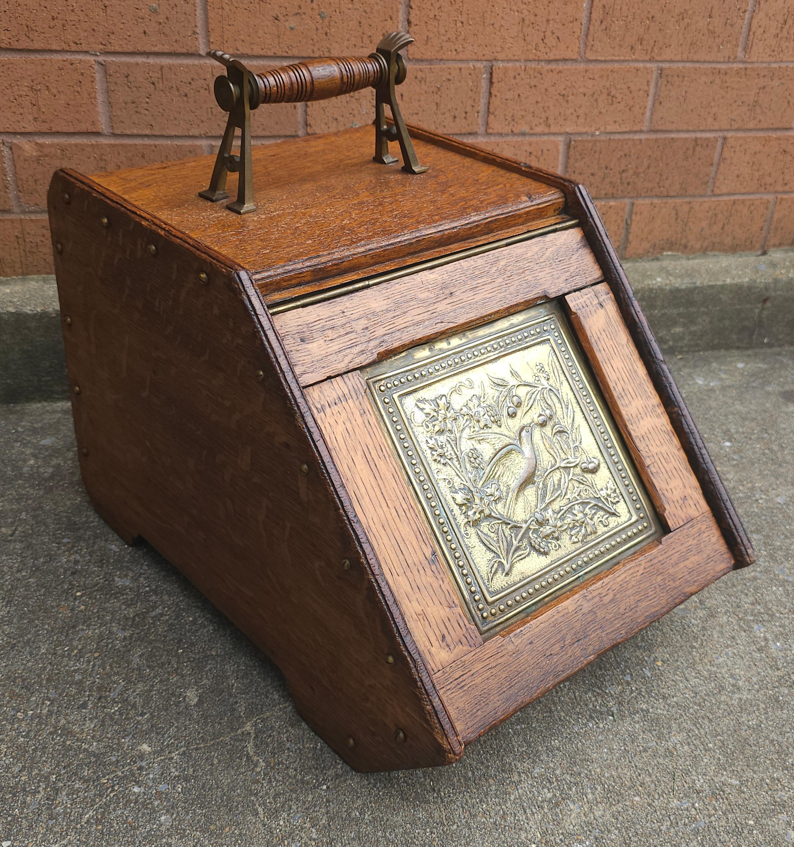 Early 20th Century Victorian Style Oak and Brass Ornate Coal Scuttle. Measures 13
