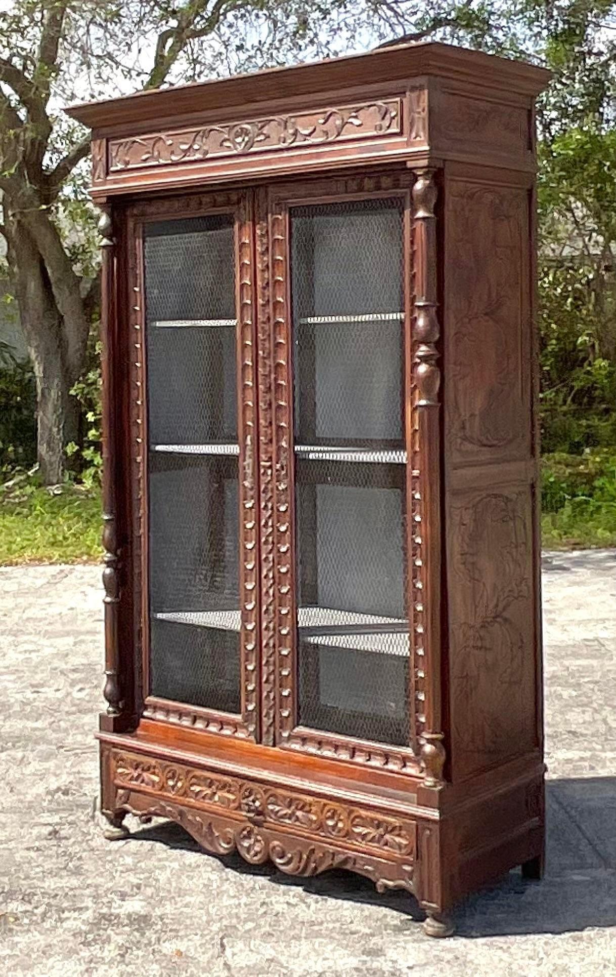 Early 20th Century Vintage Boho Carved Display Cabinet In Good Condition For Sale In west palm beach, FL