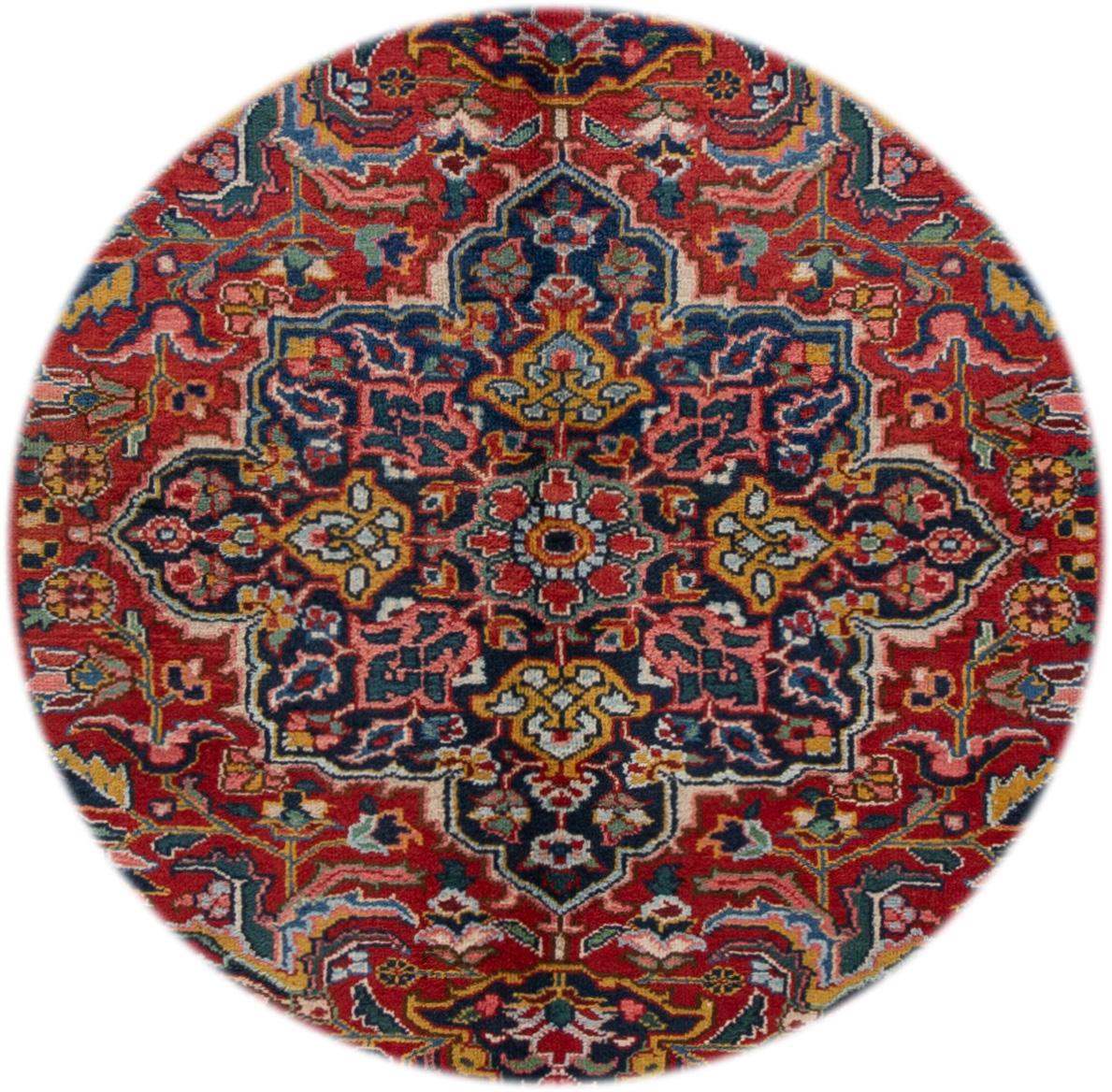 Beautiful hand knotted Heriz wool rug with a red field and a black border. This rug features an all-over floral medallion design. 

This rug measures 6' 2