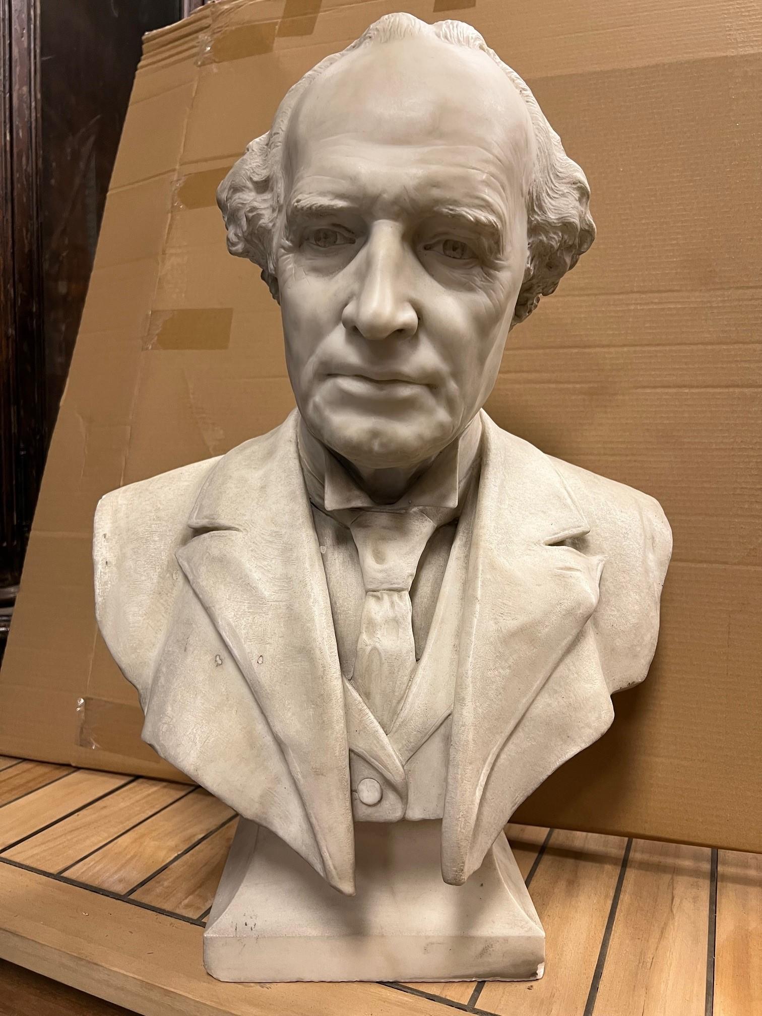 Early 20th century marble bust of a very distinguished gentleman with a jacket, vest and necktie. No signature and not sure who the gentleman is but the carving is very well done. The artist's achieved a realism to the gentlemans face, it's a great