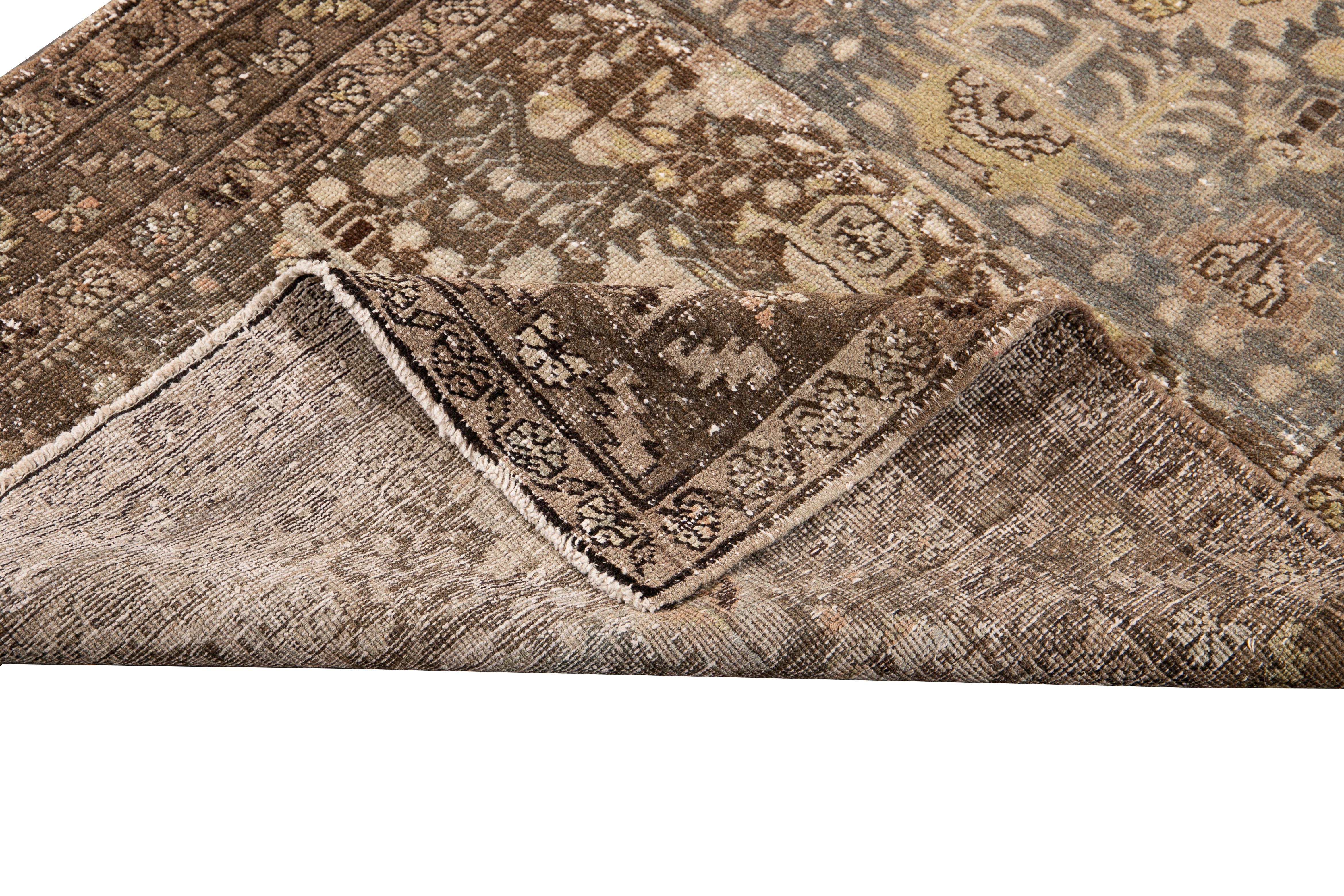 Beautiful antique Persian Malayer gray Runner rug with a brown border and gray field with a traditional all-over floral design, circa 1910.

This rug measures: 3'5