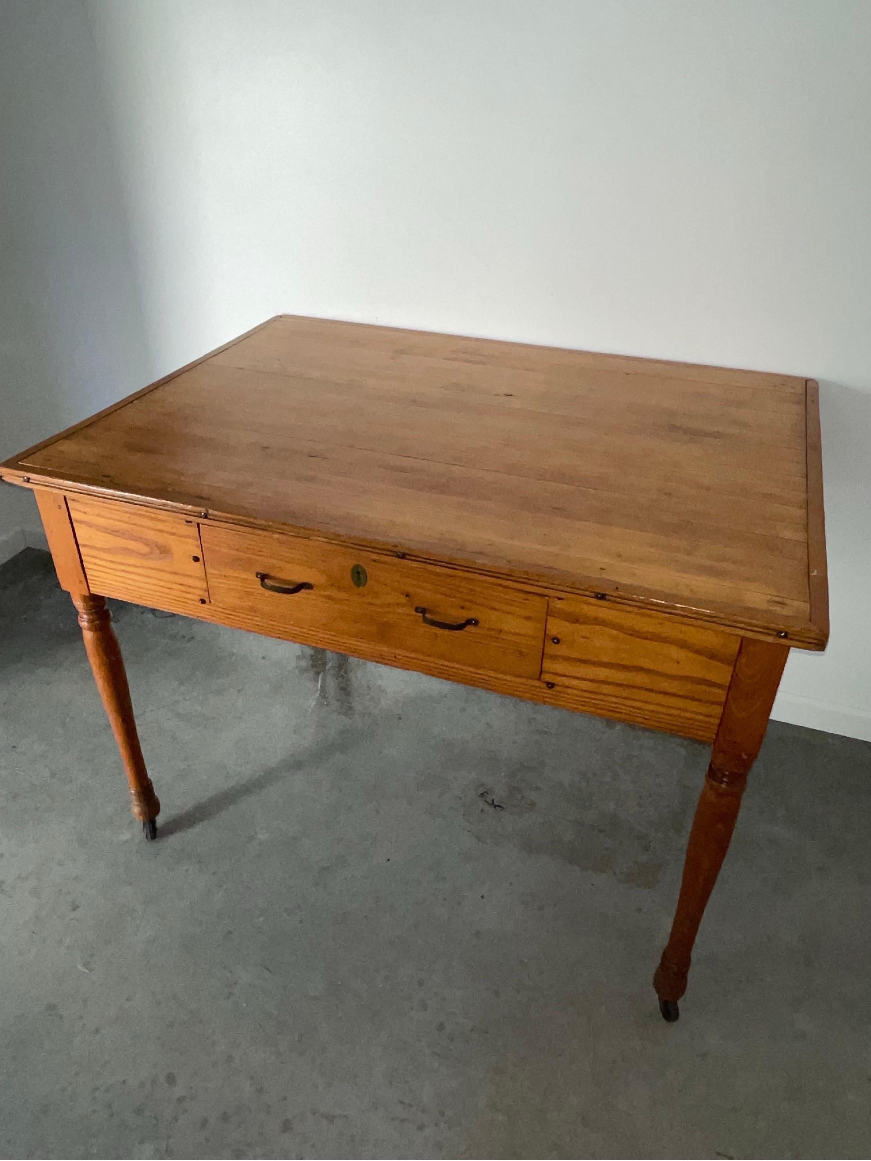 Butcher block Style Top Farm Table or Kitchen Island with casters to easily move around. 

Vintage one drawer wood scrub top work table kitchen island. This stylish work table features carved leg wood base with a very deep drawer with original metal