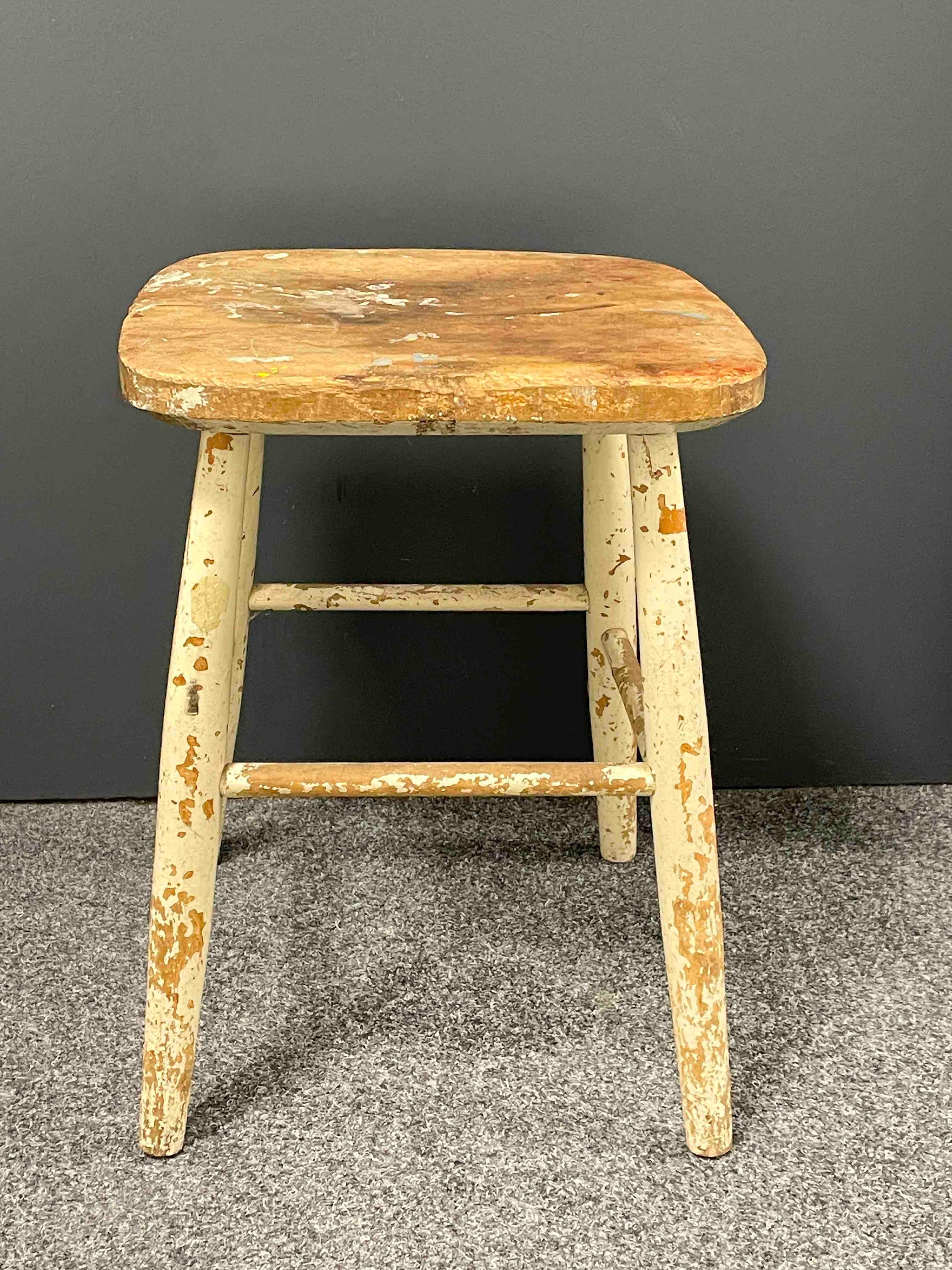 Classic 1910s or older, wood stool. Made of wood, hand painted, hand carved. Found at an estate sale in Stockholm, Sweden. Some paint lost and in shabby chic design, but this is old-age. Has parts of the old manufactory label but can not read it.