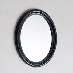Wandspiegel des frühen 20. Jahrhunderts – lackierter schwarzer ovaler Rahmen