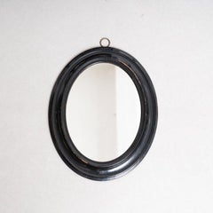 Espejo de pared de principios del siglo XX - Marco oval negro lacado