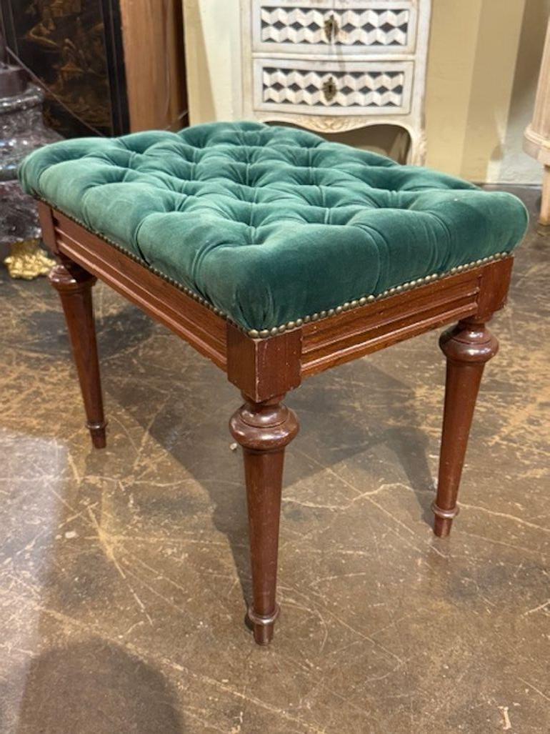 This product is an early 20th century English Charles X Style walnut bench with tufted upholstery in green.  A handsome bench, perfect for adding a touch of elegance to any room. Circa 1920
22w x 16d x 20h