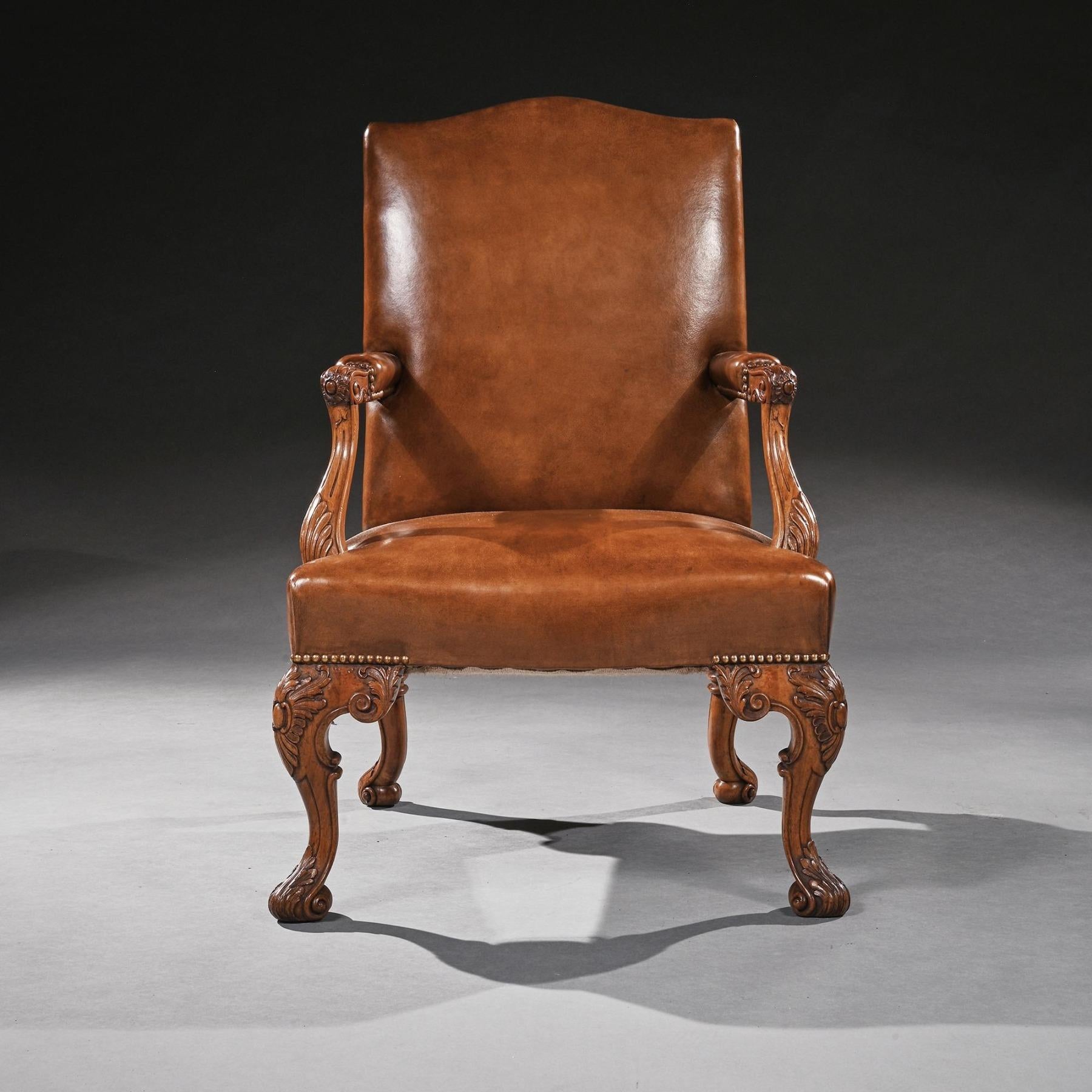 A well drawn early 20th Century walnut Gainsborough type leather upholstered desk - armchair on cabriole legs in the 18th Century manner.



English circa 1910.



The arched and stuffed back recently upholstered in a hand dyed leather above