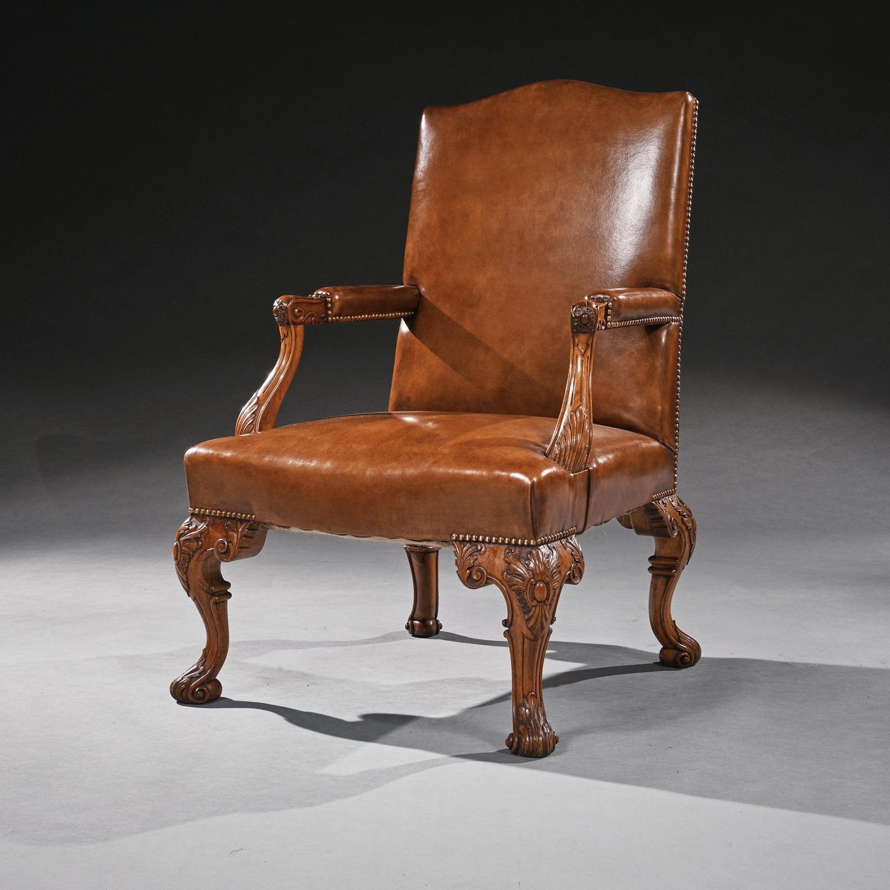 English Early 20th Century Walnut Carved Leather Upholstery Armchair For Sale
