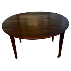 Early 20th Century Walnut Directoire Drop Leaf Table with Brass Sabot's
