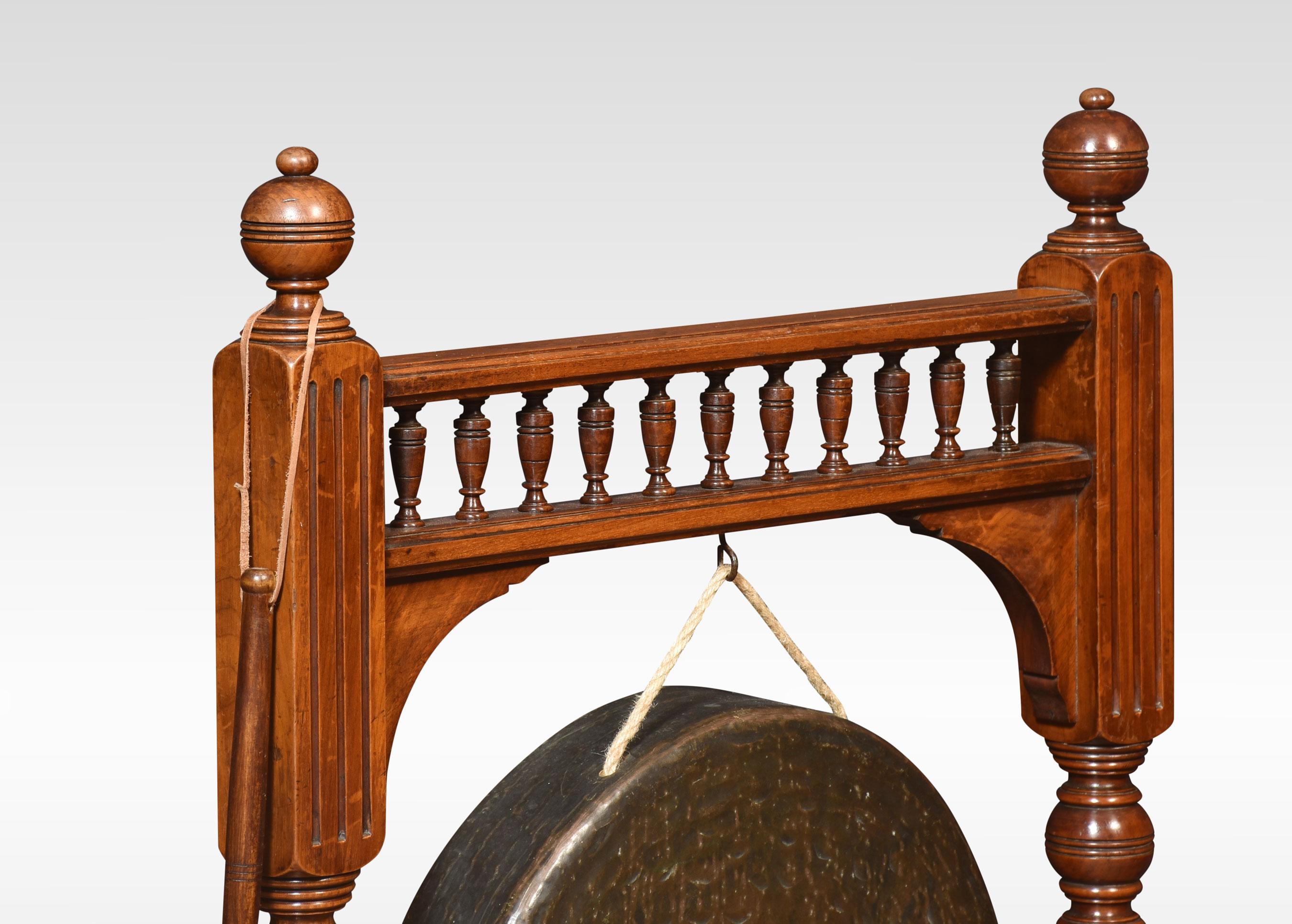 Large Carved walnut dinner gong, the frame with carved decoration. Flanked by carved fluted uprights. All raised up on trestle base, with a striker.
Dimensions
Height 39 Inches
Width 25.5 Inches
Depth 12 Inches