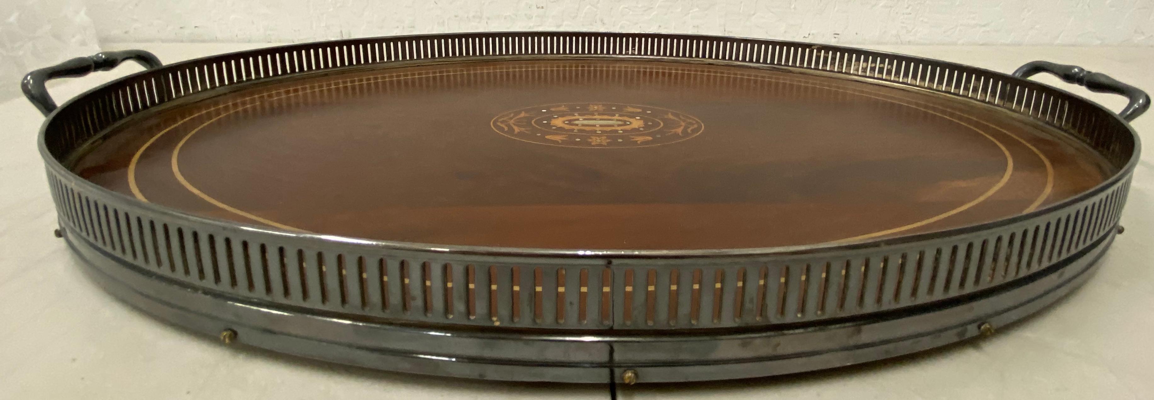 Early 20th century walnut serving tray with inlay

Handsome serving / drinks tray

Measures: 20