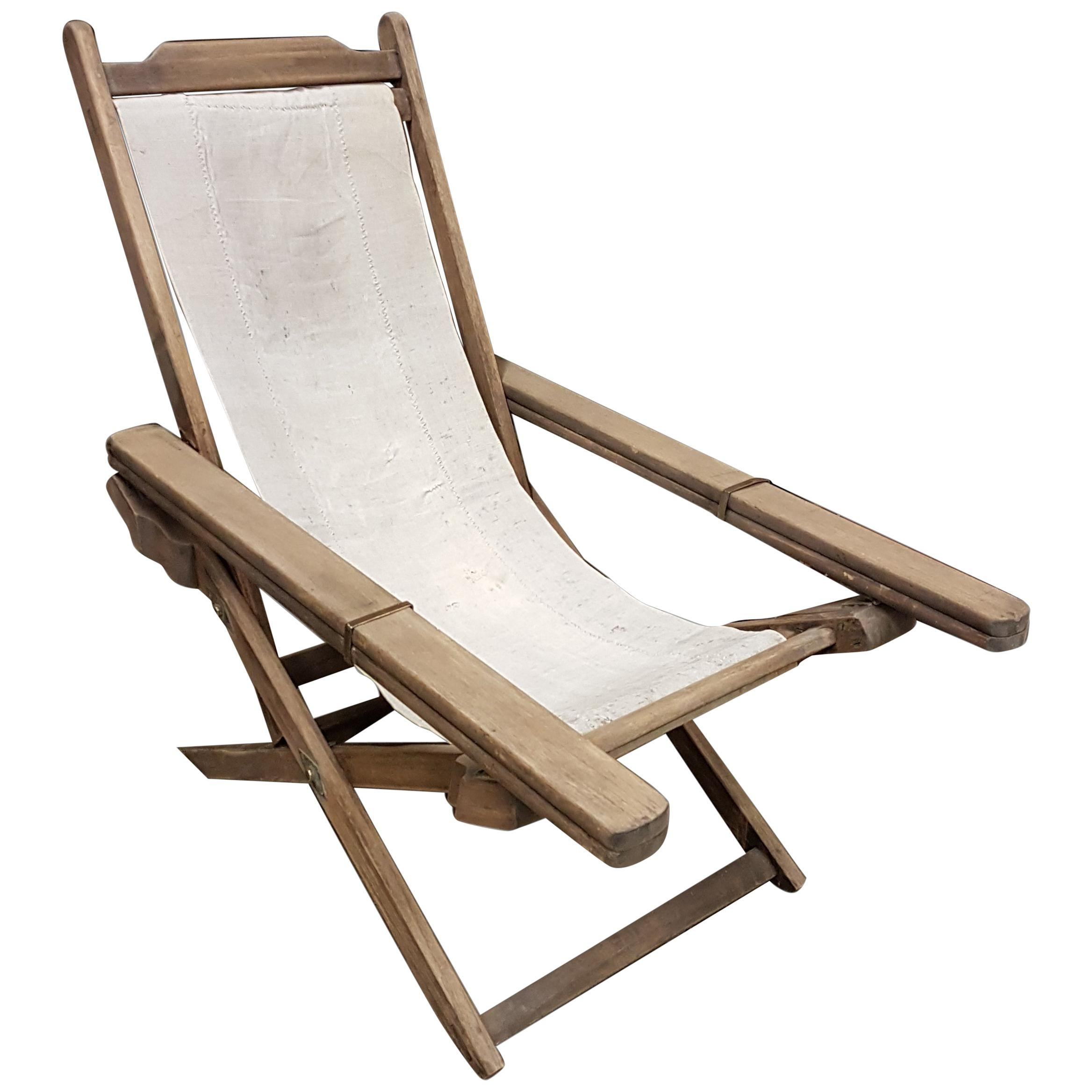 Early 20th Century Weathered Teak Colonial Plantation Lounger Chair For Sale