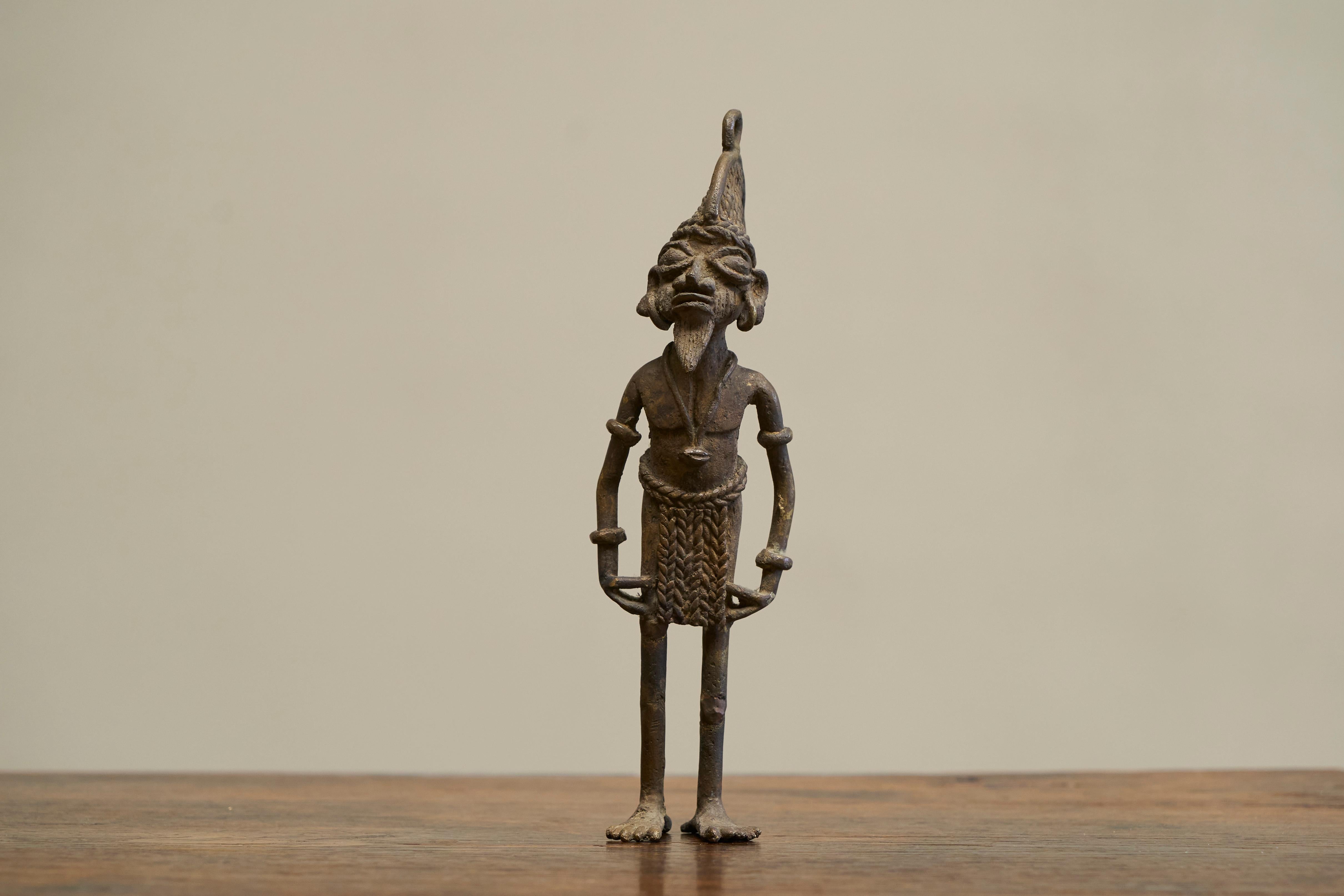 Early 20th Century West African Tribal Figurine in Cast Brass.

Very distinct early to mid 20th century tribal figurine in cast brass from the west of Africa. Great and very typical figurine - great hand made quality. Cast and finished with hand.