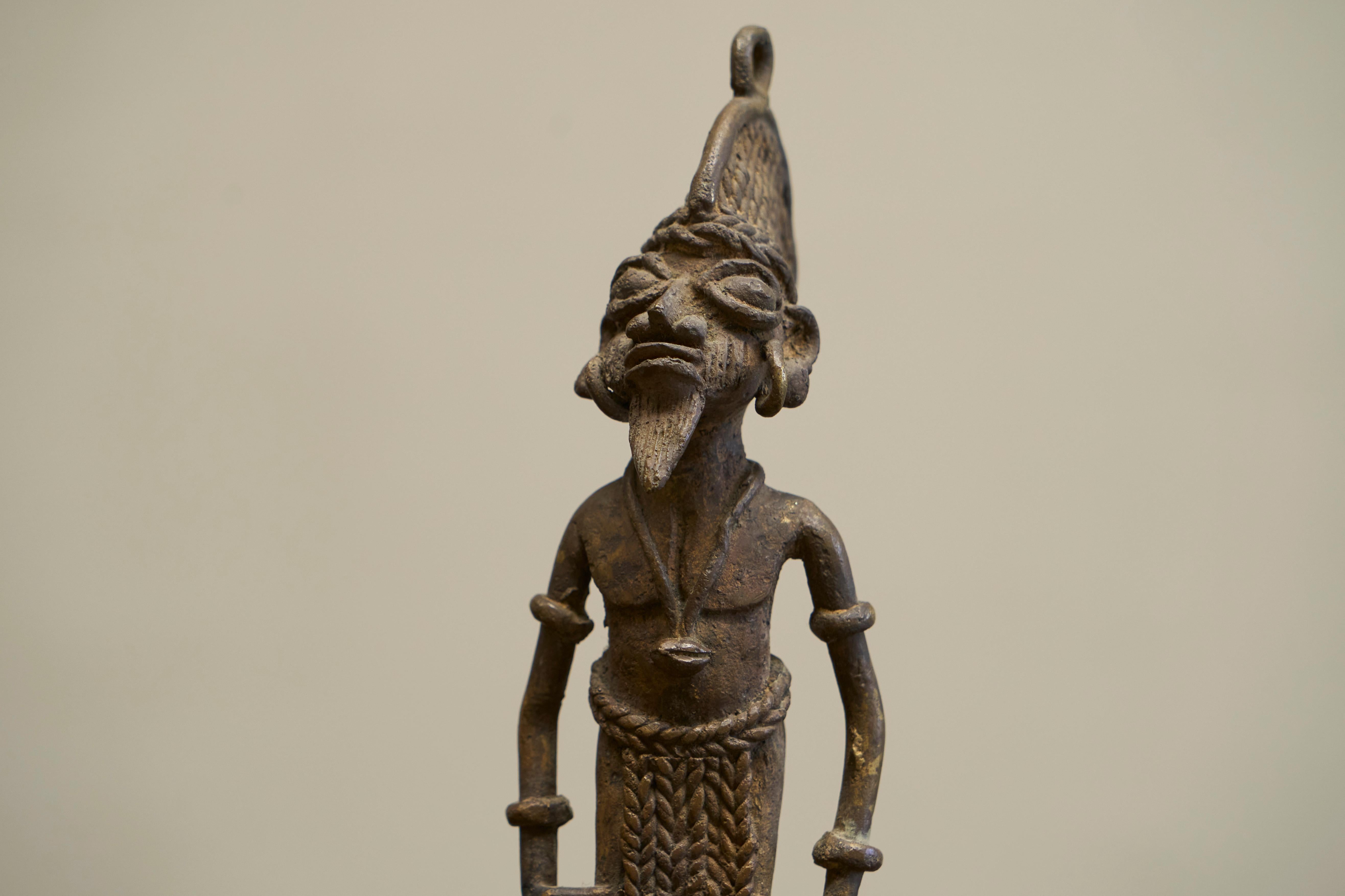 Hand-Crafted Early 20th Century West African Tribal Figurine in Cast Brass For Sale