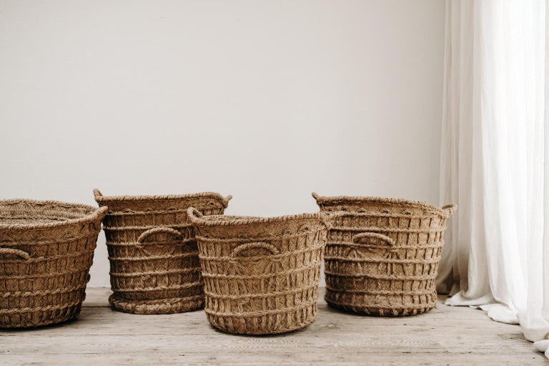 A big lot of these available, wicker baskets from Portugal, where these were used to collect almonds. 
They now make great baskets next to the log fire or linen basket or to store a plant or even the
Christmas tree.. a highly decorative object !