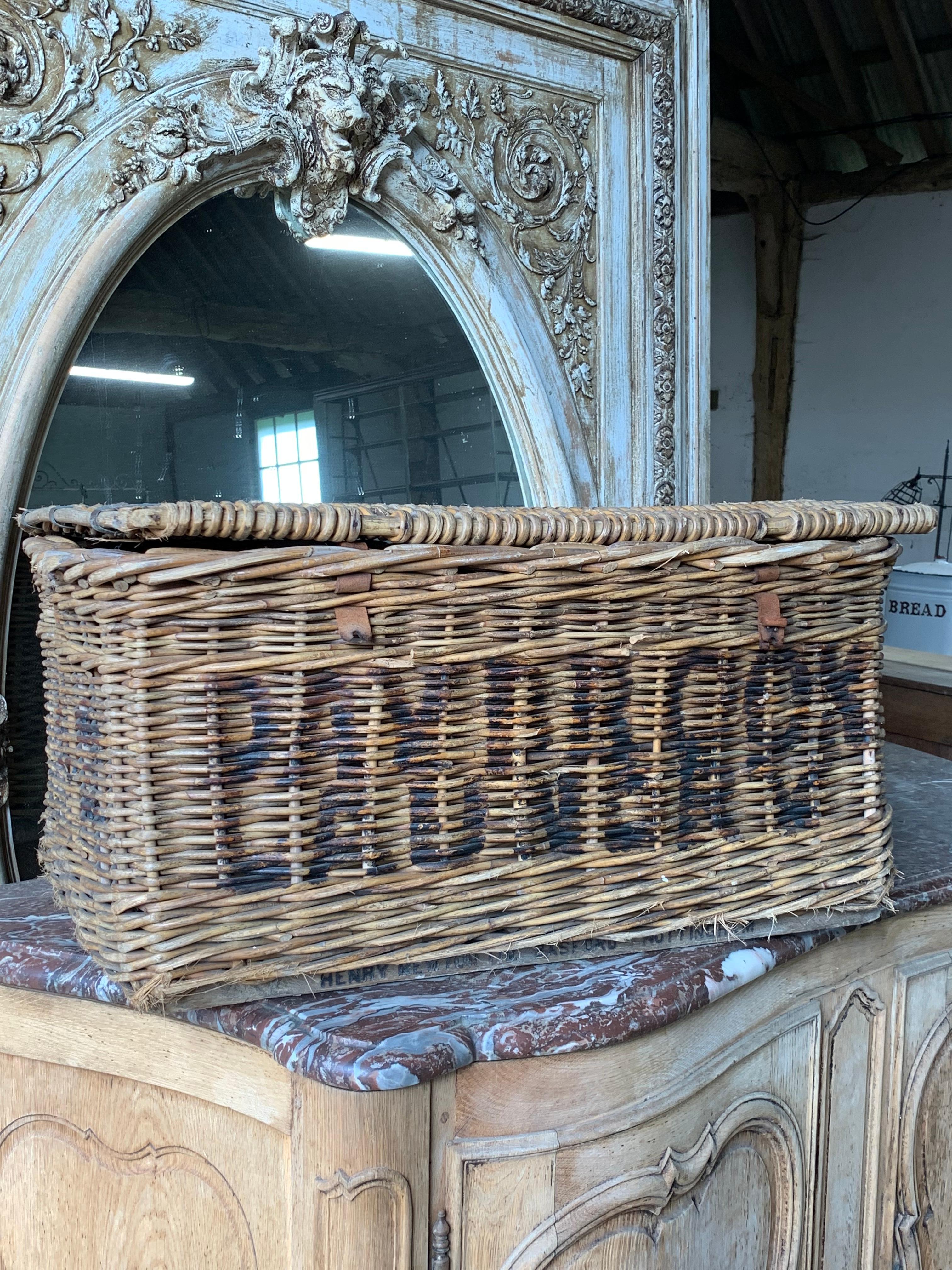 A nice wicker laundry basket from the first half of the 20th century. Nice original wording on the sides and top. This would make a nice log basket next to the fire.

Please contact us directly for a worldwide shipping quote 