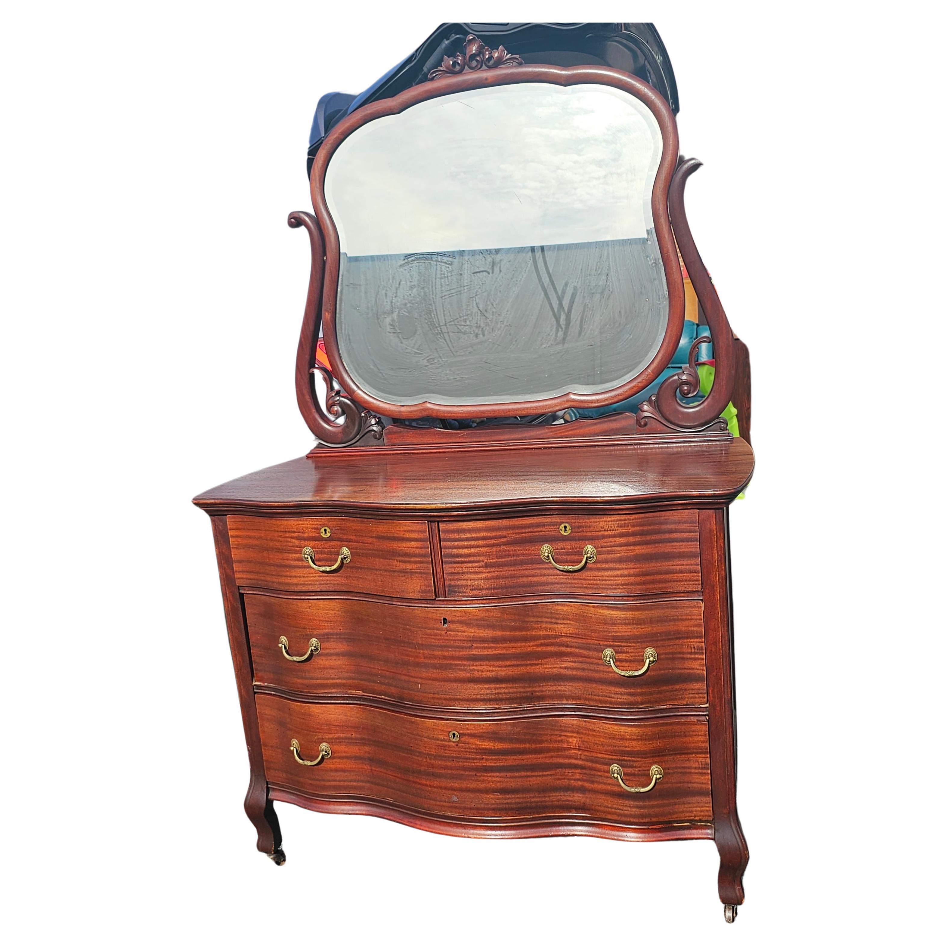 American Early 20th Century Widdicomb Mahogany Serpentine Chest with Mirror on Wheels For Sale