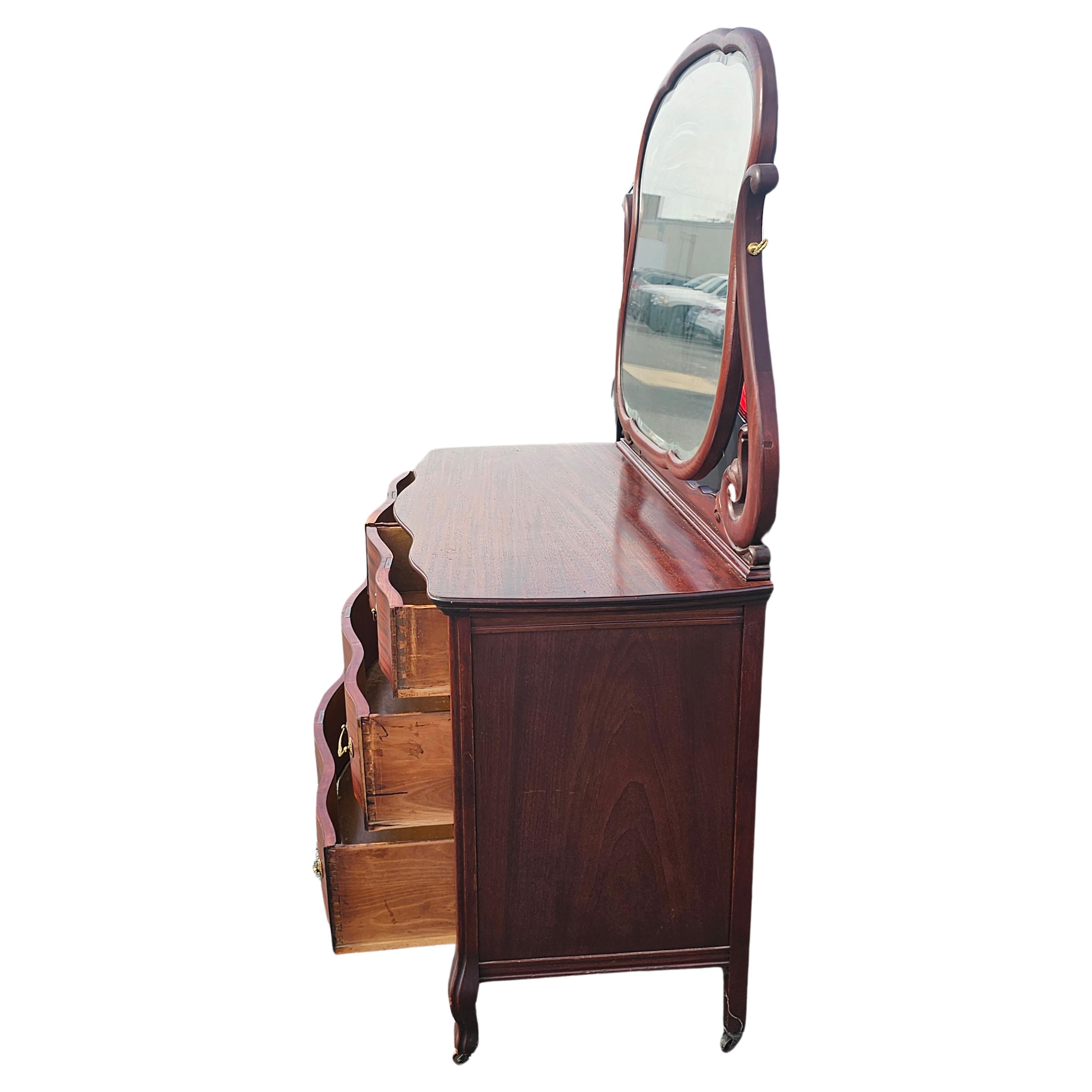 Early 20th Century Widdicomb Mahogany Serpentine Chest with Mirror on Wheels For Sale 1