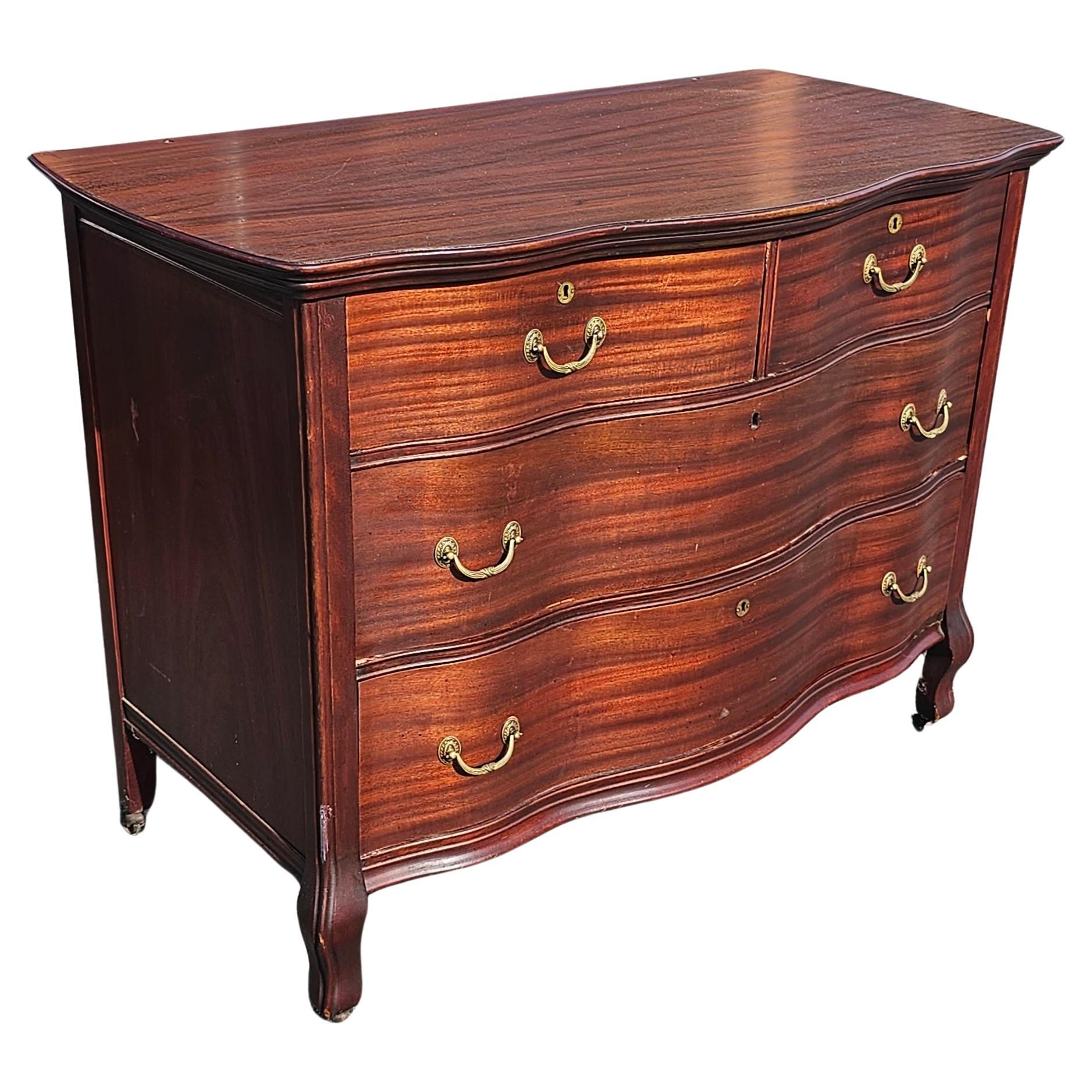 Victorian Early 20th Century Widdicomd Tiger Mahogany Serpentine Commode Chest on Wheels For Sale
