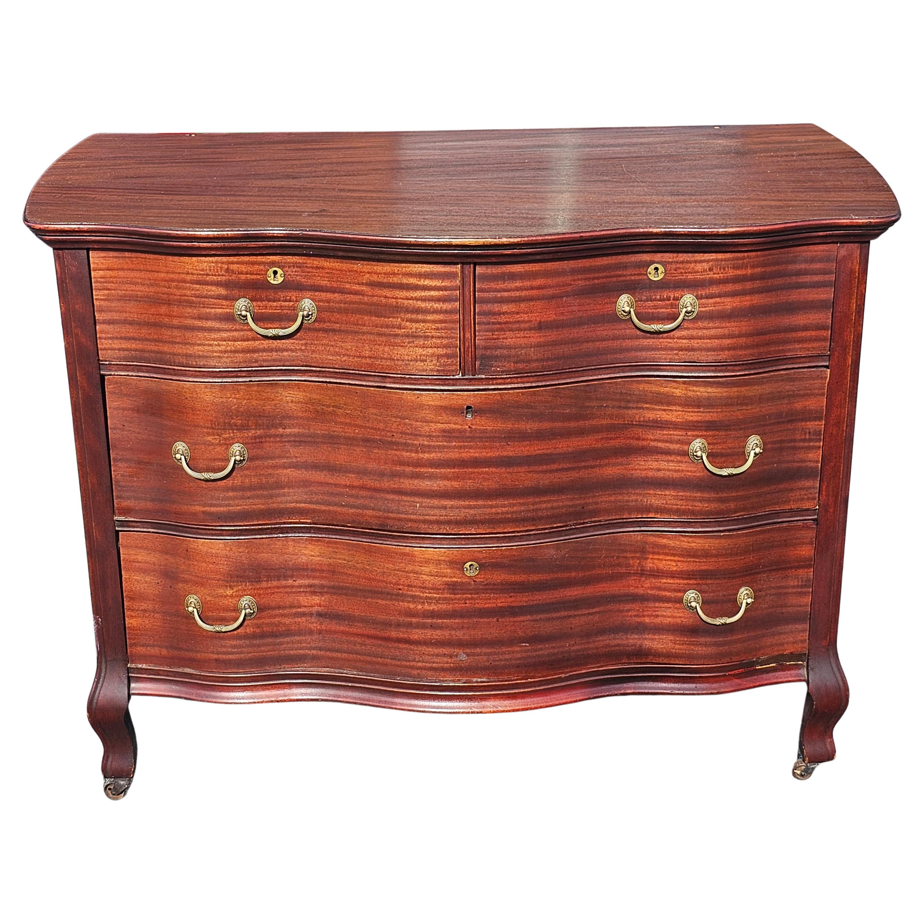Early 20th Century Widdicomd Tiger Mahogany Serpentine Commode Chest on Wheels